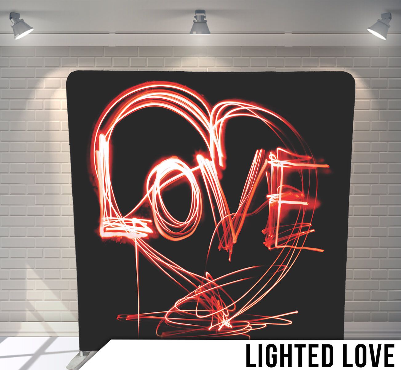 Red neon light heart with love text on black background.