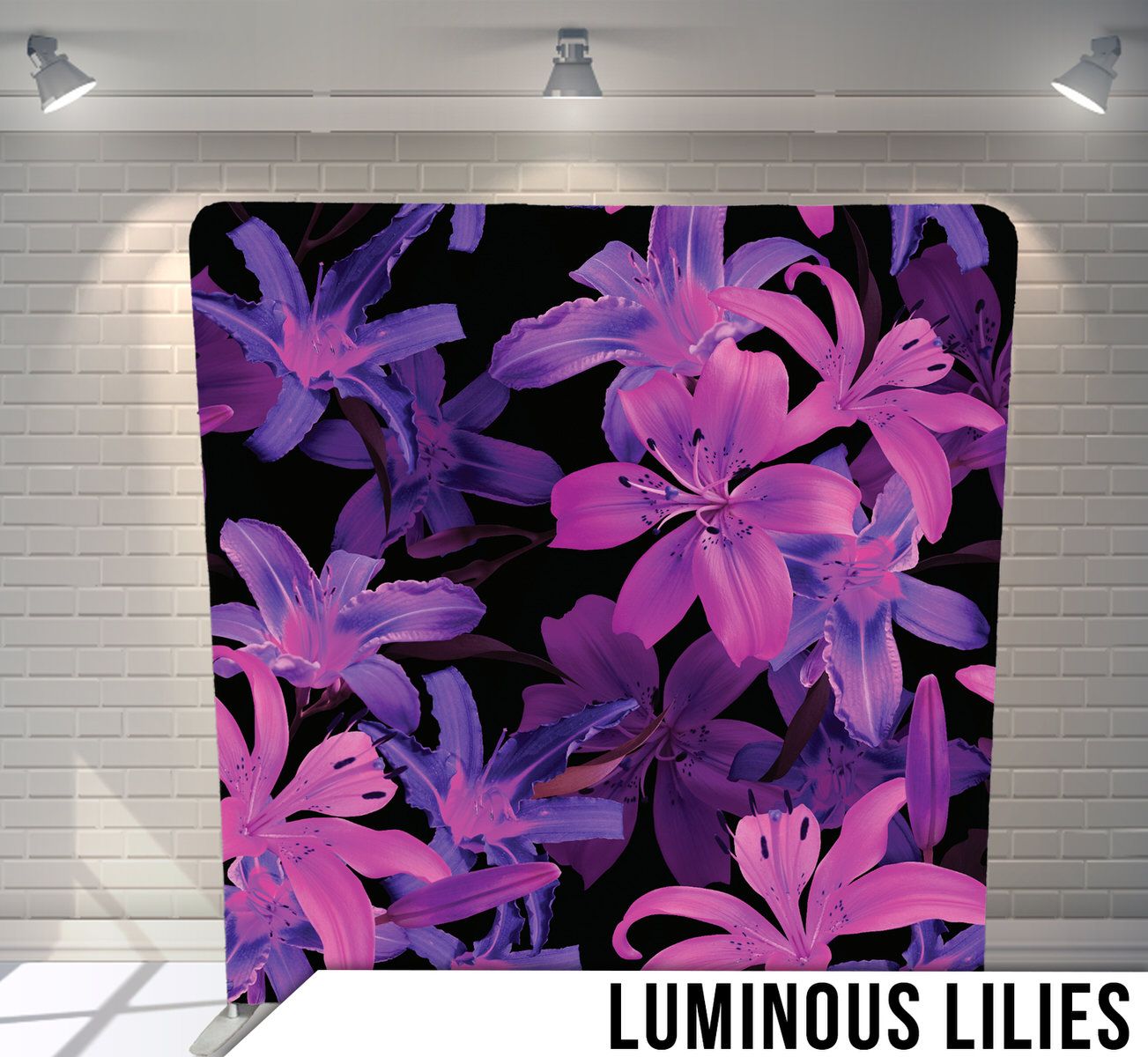 Vibrant purple and pink lily flowers pattern on black background.