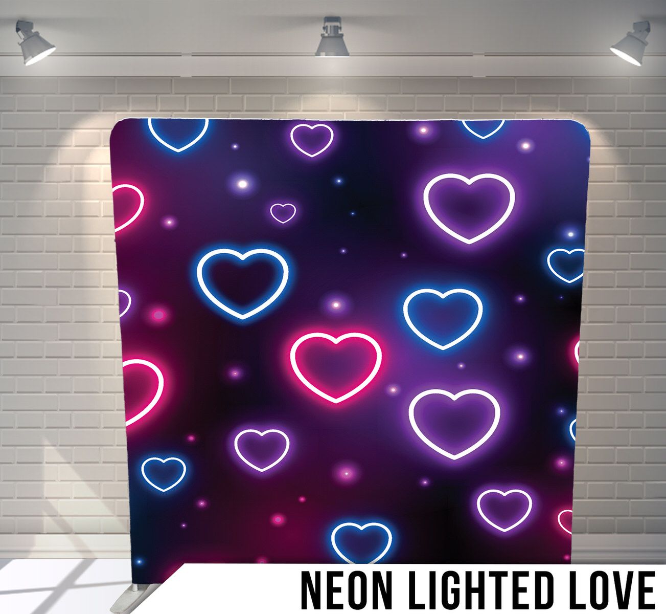 Neon hearts in pink, purple, and blue colors floating on dark space background.