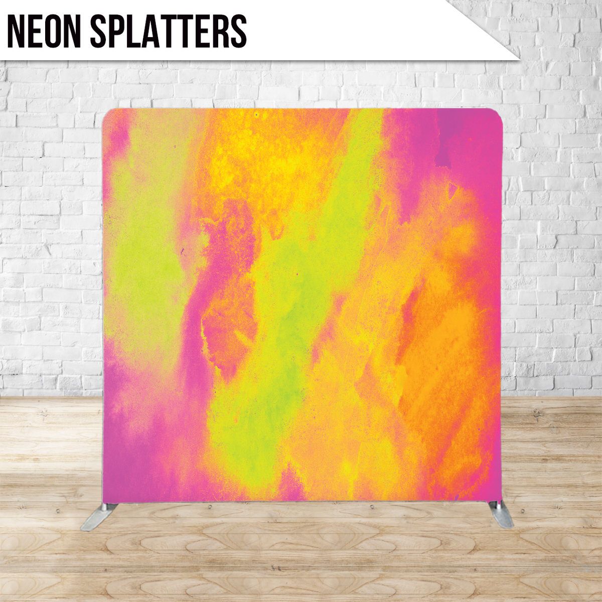Abstract colorful neon paint splatters in pink, yellow, and orange creating a vibrant gradient effect.