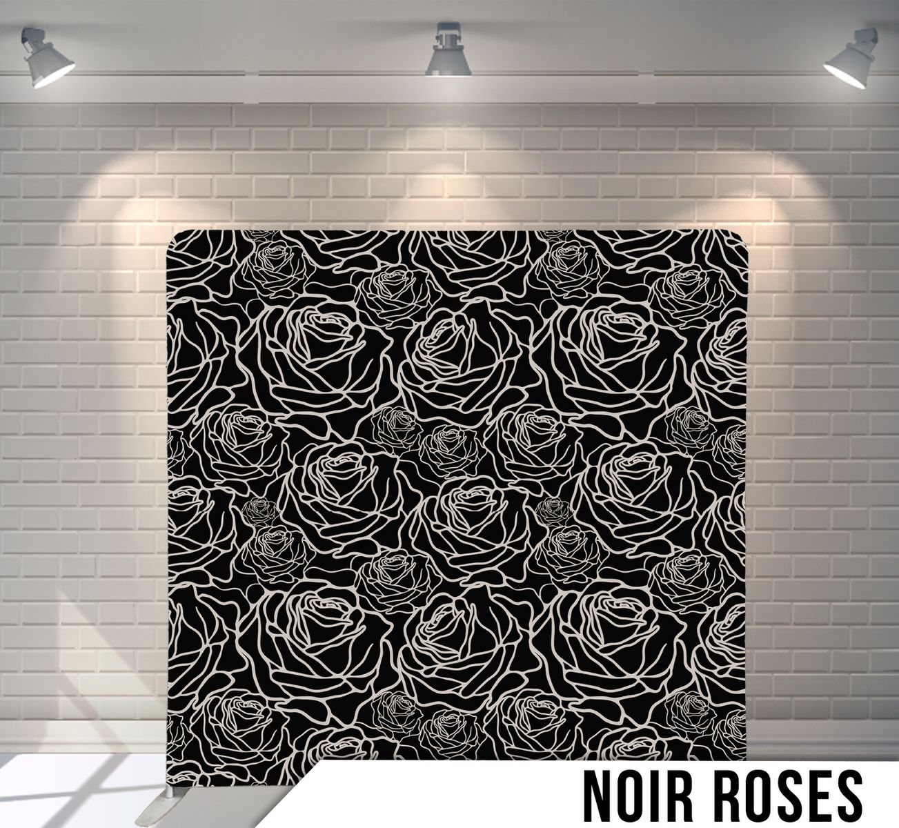 Black and white floral pattern featuring repeating rose outlines on a dark background.