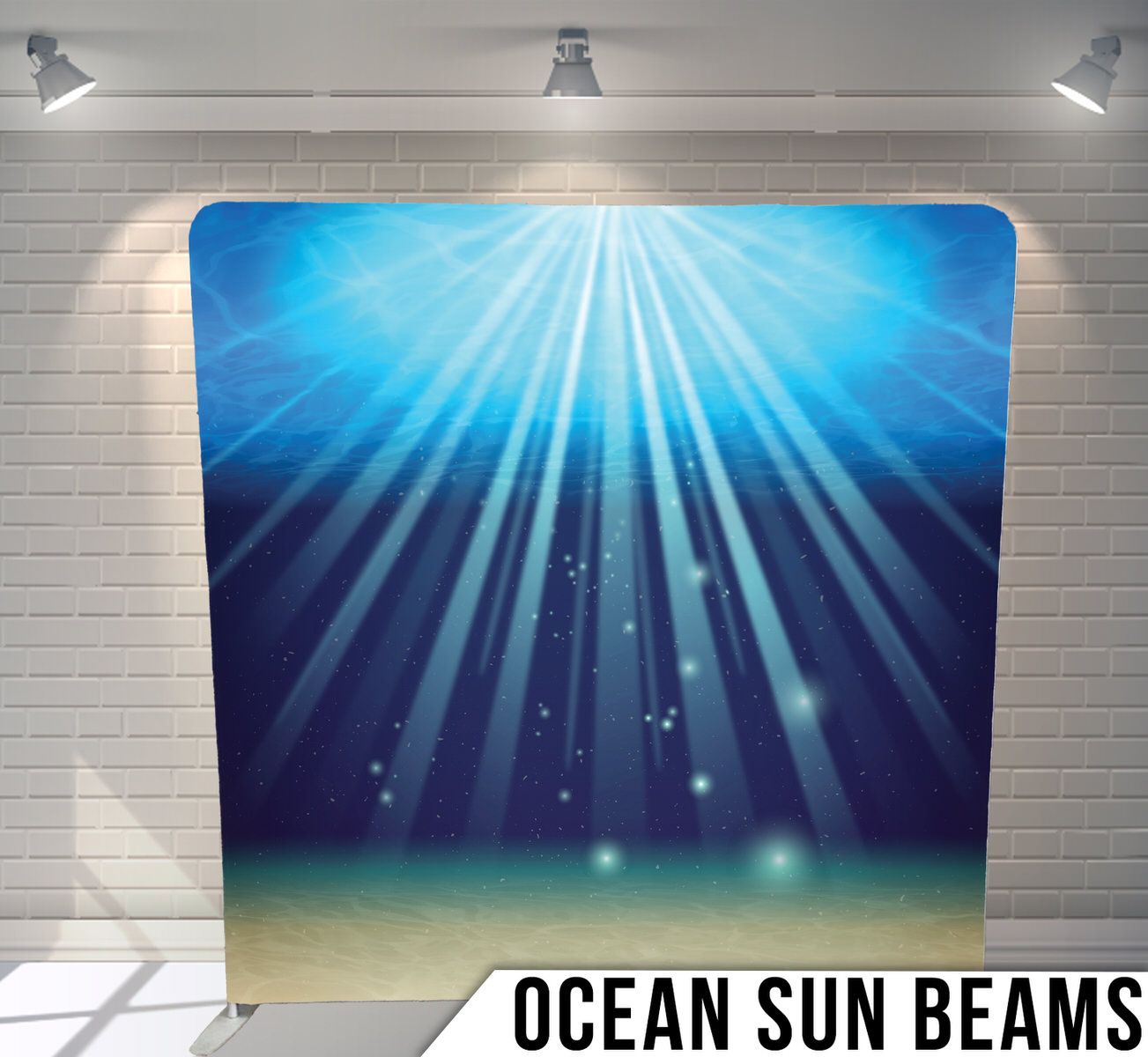 Underwater scene with sunbeams penetrating deep blue ocean waters.