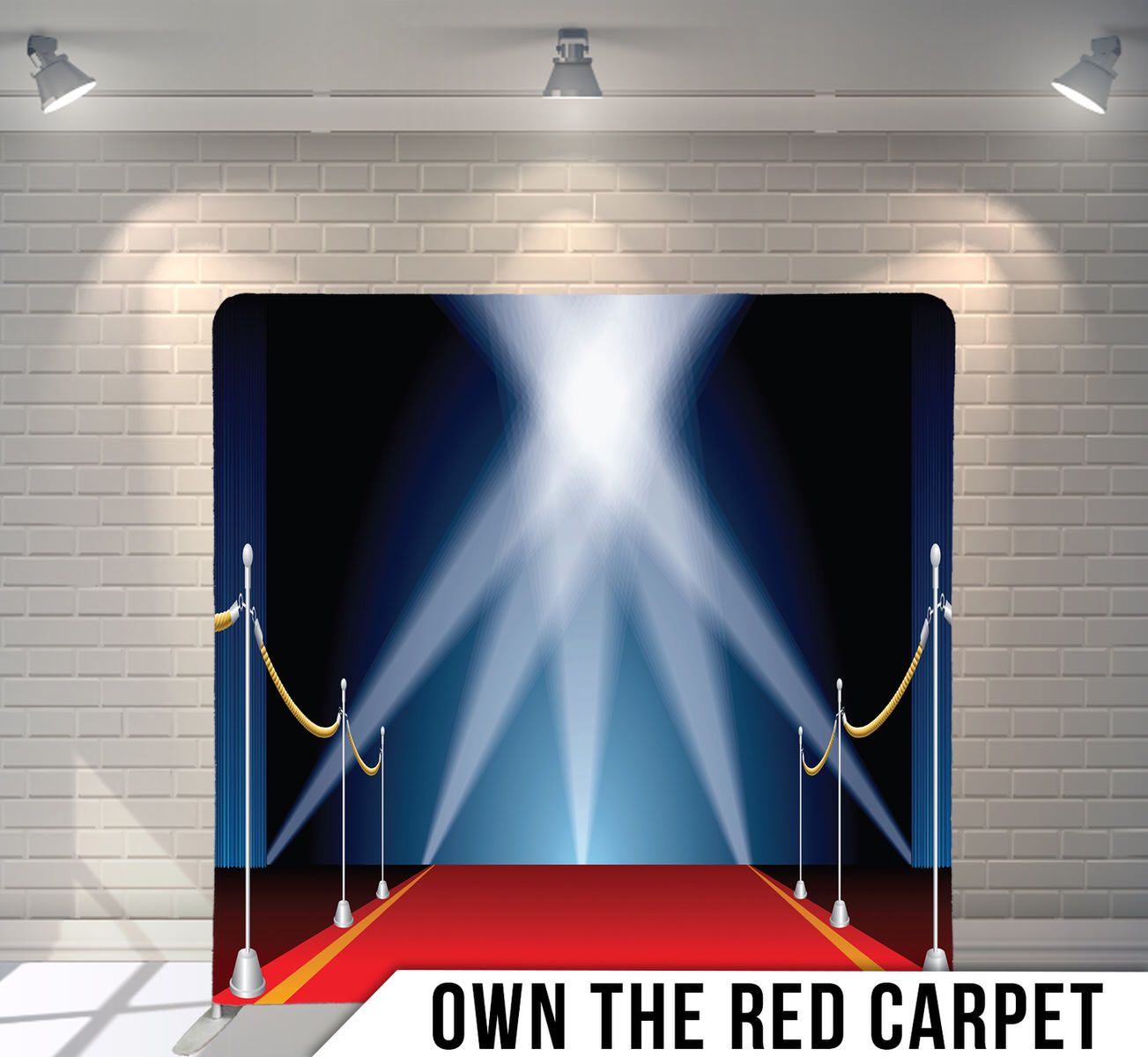 Red carpet with velvet ropes and dramatic blue spotlights creating a VIP entrance atmosphere.