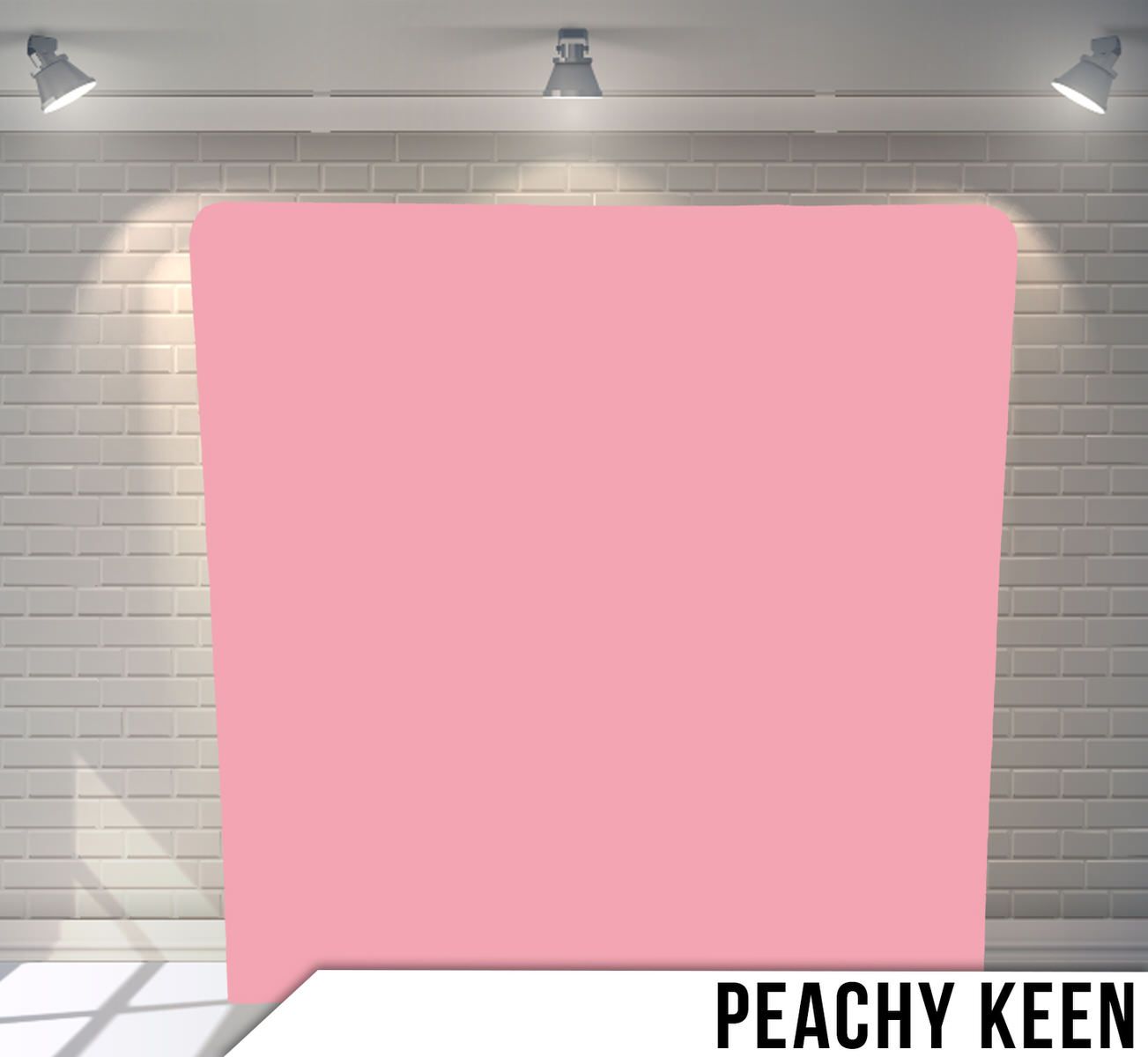 Solid peachy pink colored backdrop with subtle lighting effects.