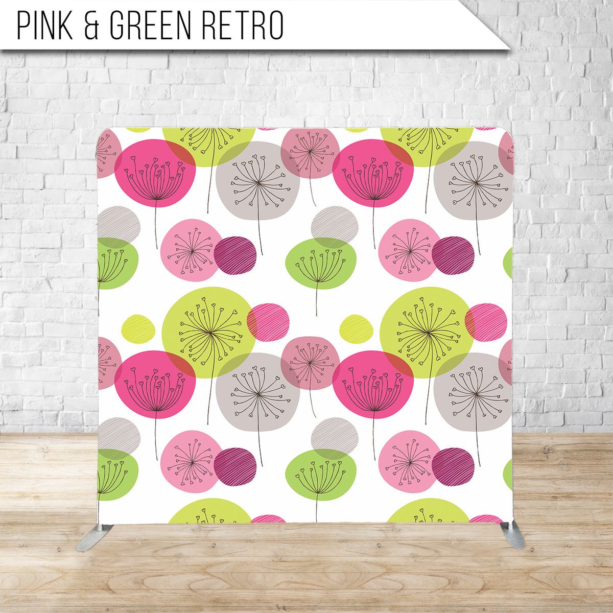 Retro pattern with pink and green abstract floral shapes on white background.