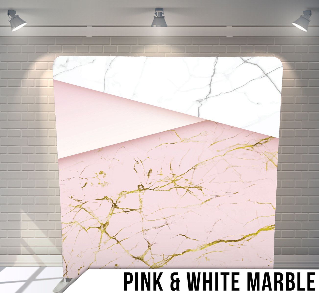 Modern geometric pink and white marble pattern with gold veining on photo backdrop.