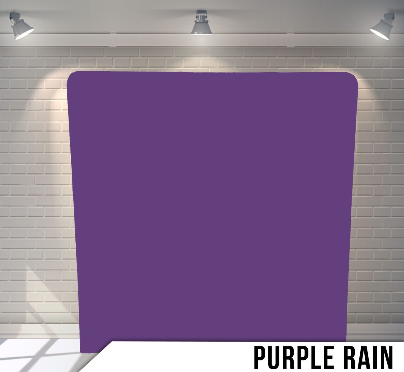 Solid purple photography backdrop with matte finish mounted on white brick wall.