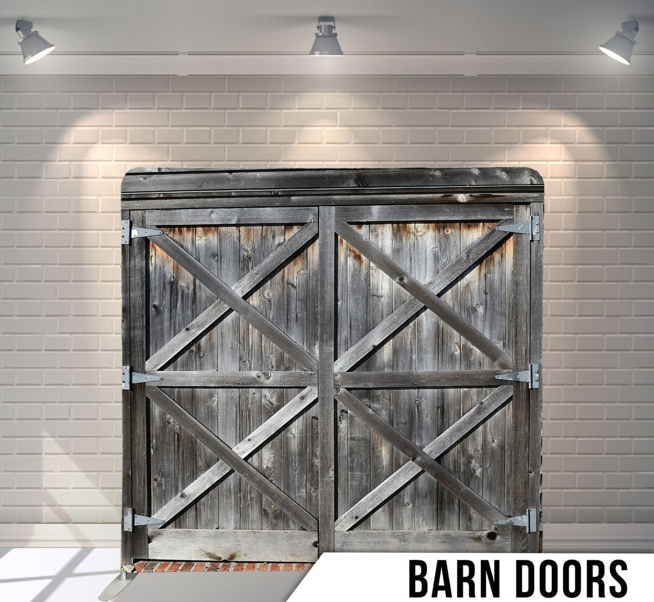 Weathered wooden barn doors with crossed X-pattern braces in rustic gray finish.