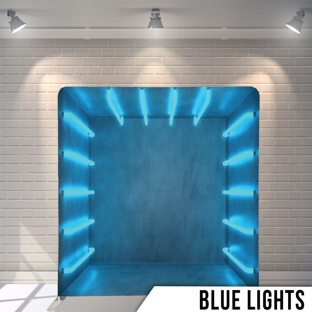 Blue illuminated studio backdrop with glowing lights arranged around the edges.