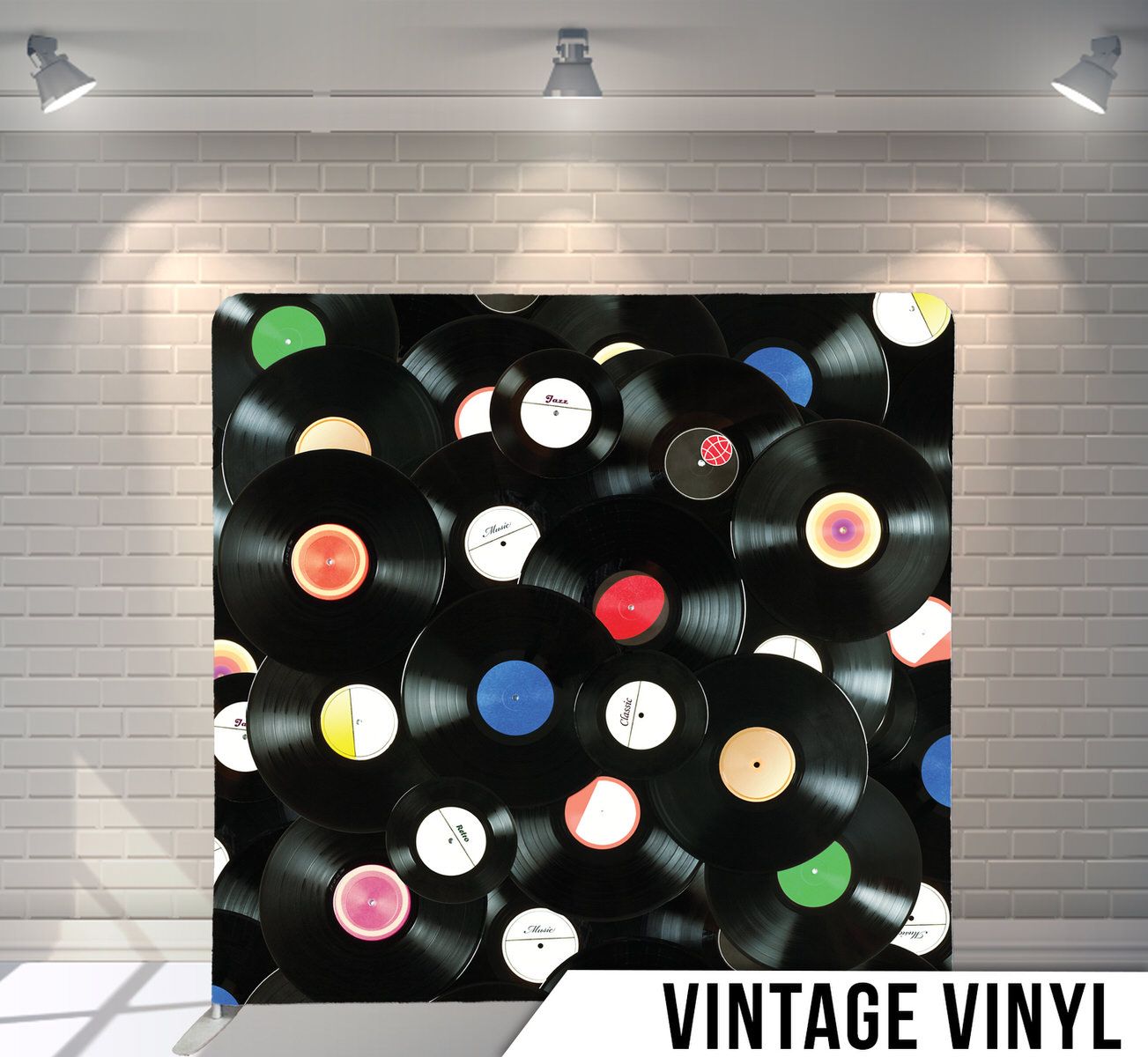 Pattern of vintage vinyl records with colorful labels arranged on black background.