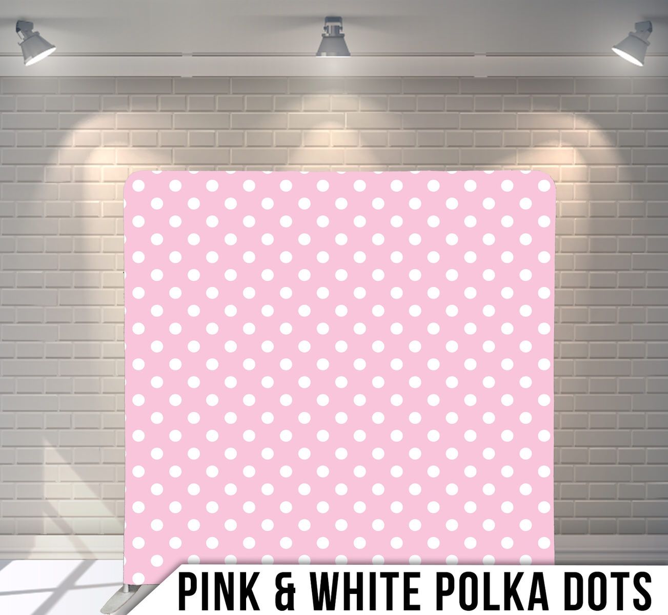 Pink and white polka dot pattern backdrop with evenly spaced circular dots on a light pink background.