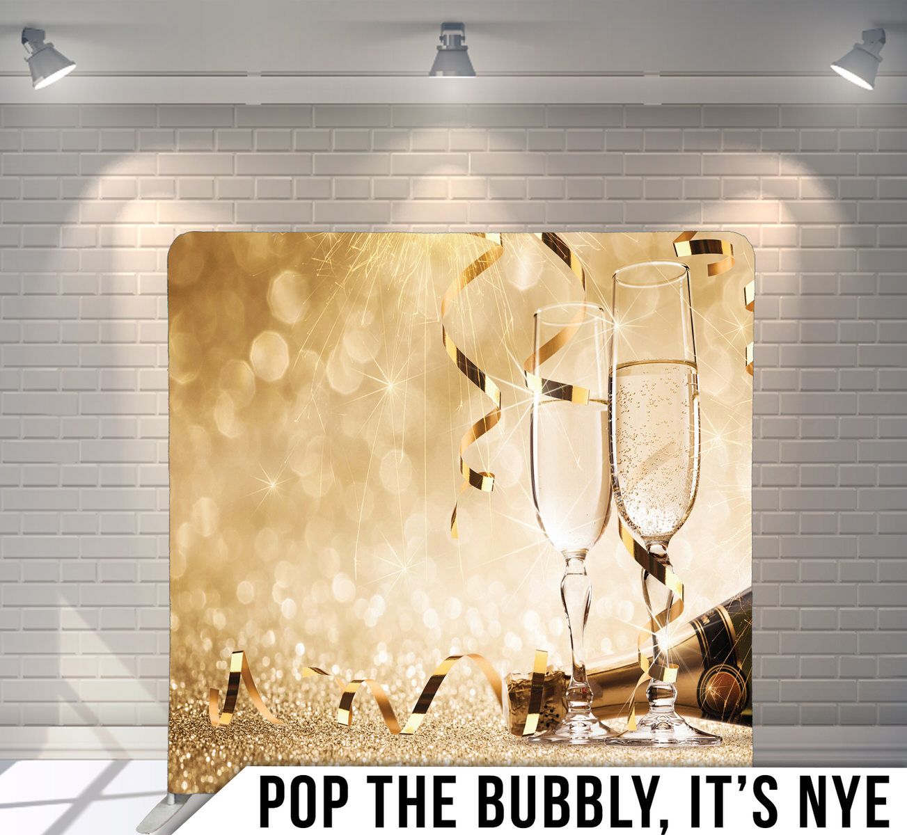 Champagne glasses with golden bokeh background for New Year's celebration.