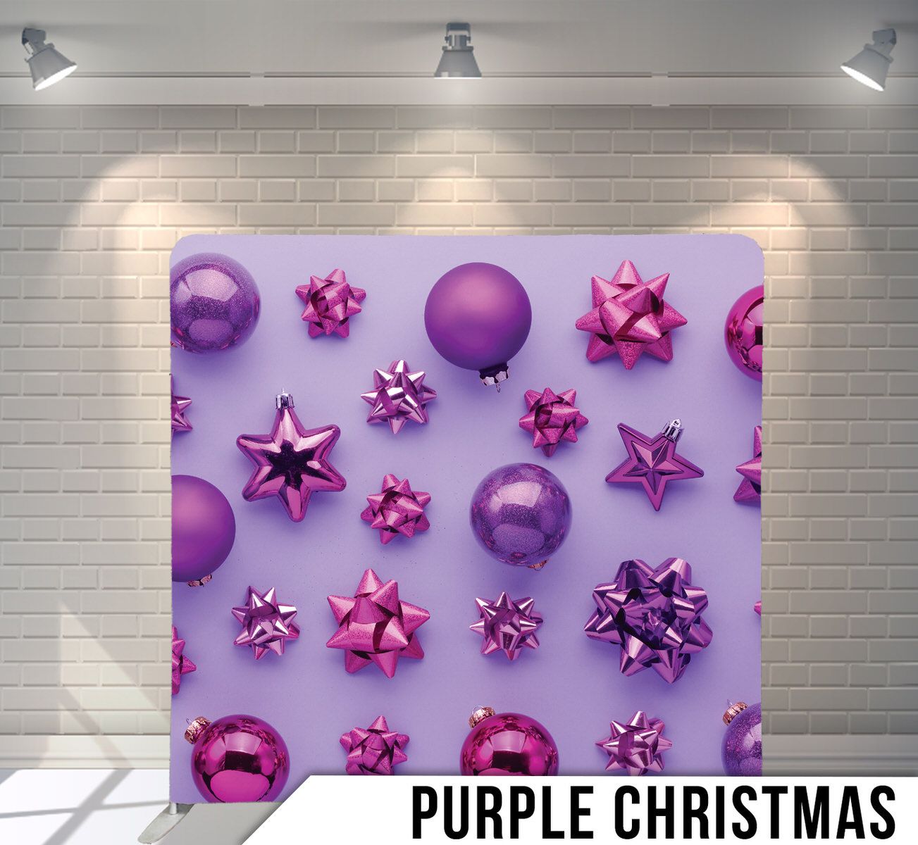Purple and pink Christmas ornaments and bows arranged on a light background.