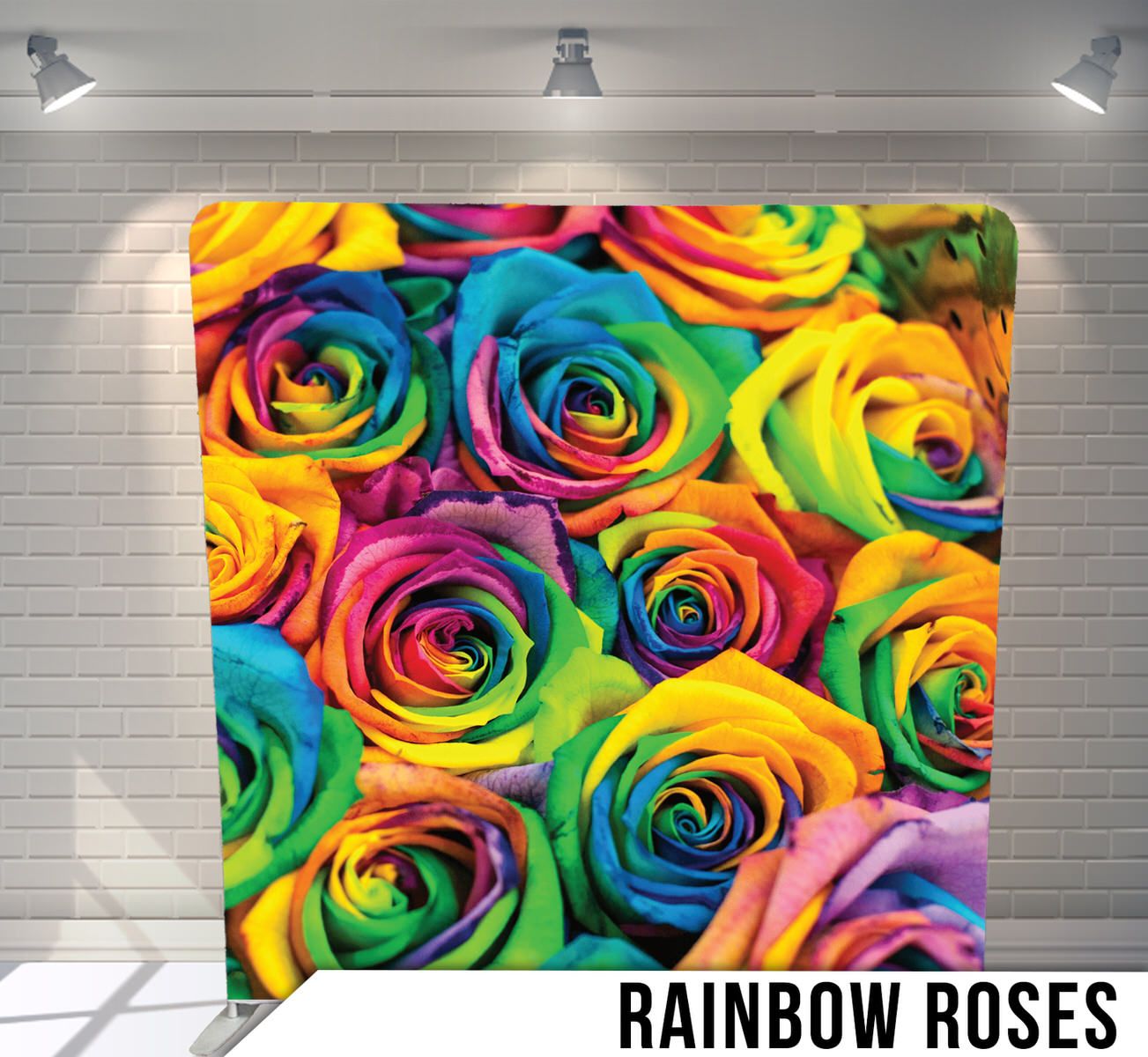 Vibrant rainbow colored roses in full bloom featuring swirling petals in blue, yellow, pink, orange and green hues.