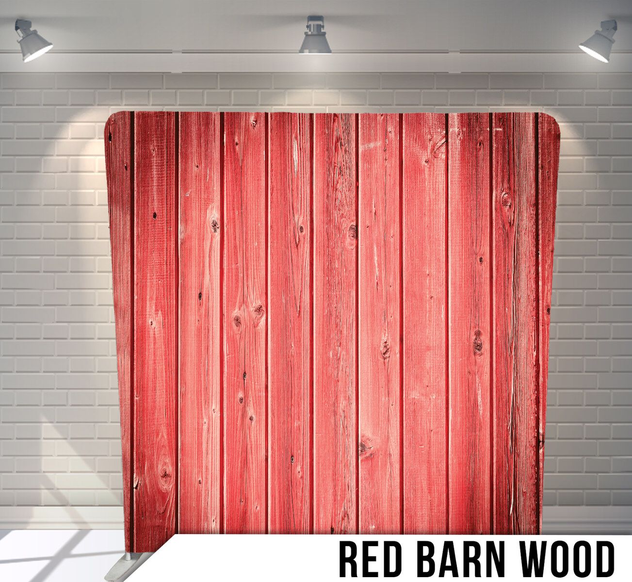 Weathered red barn wood planks arranged vertically with rustic texture.