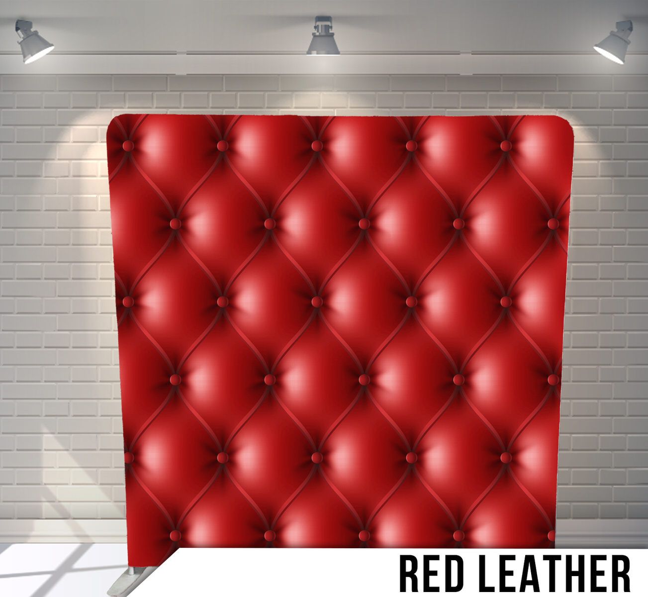 Red tufted leather upholstery texture with diamond pattern buttoning.