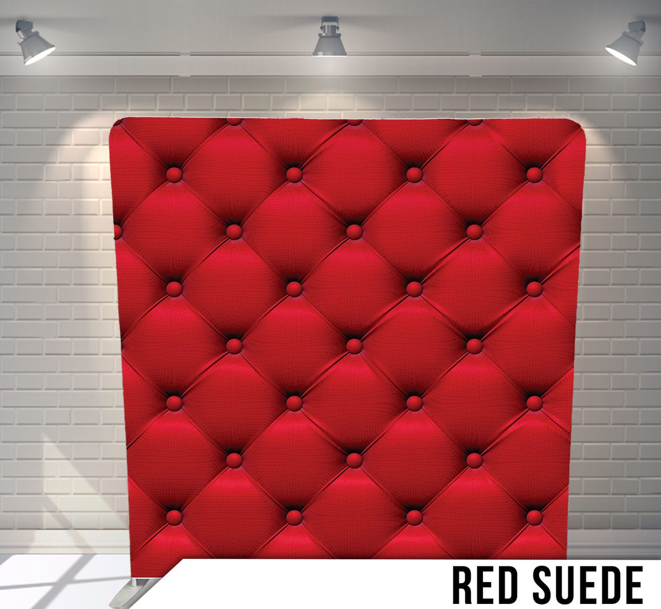 Red tufted suede upholstery background with diamond pattern buttons and elegant quilted texture.