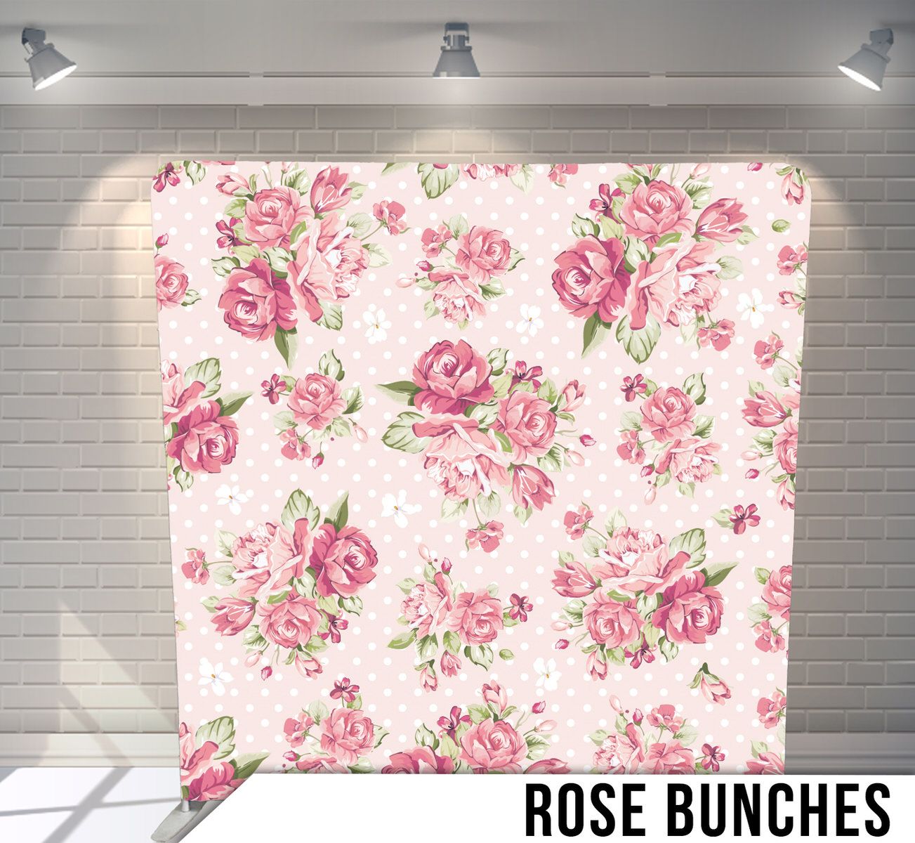 Vintage floral pattern with pink roses and green leaves on light background.