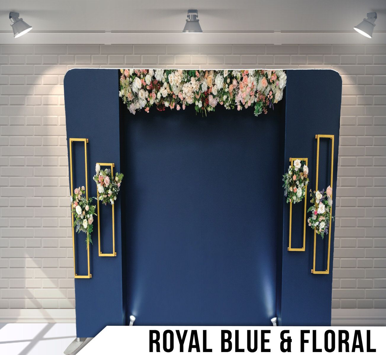 Navy blue backdrop with gold geometric frames and white floral arrangements for elegant event photography.