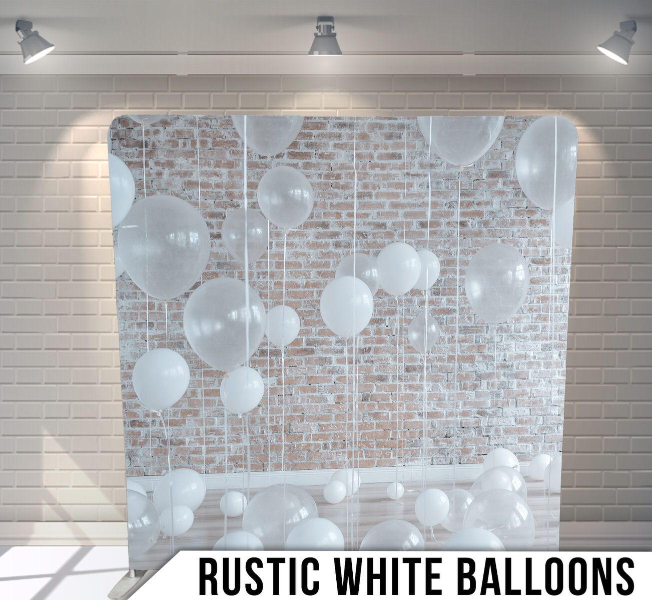 White paper lanterns suspended against exposed brick wall creating dreamy atmosphere.