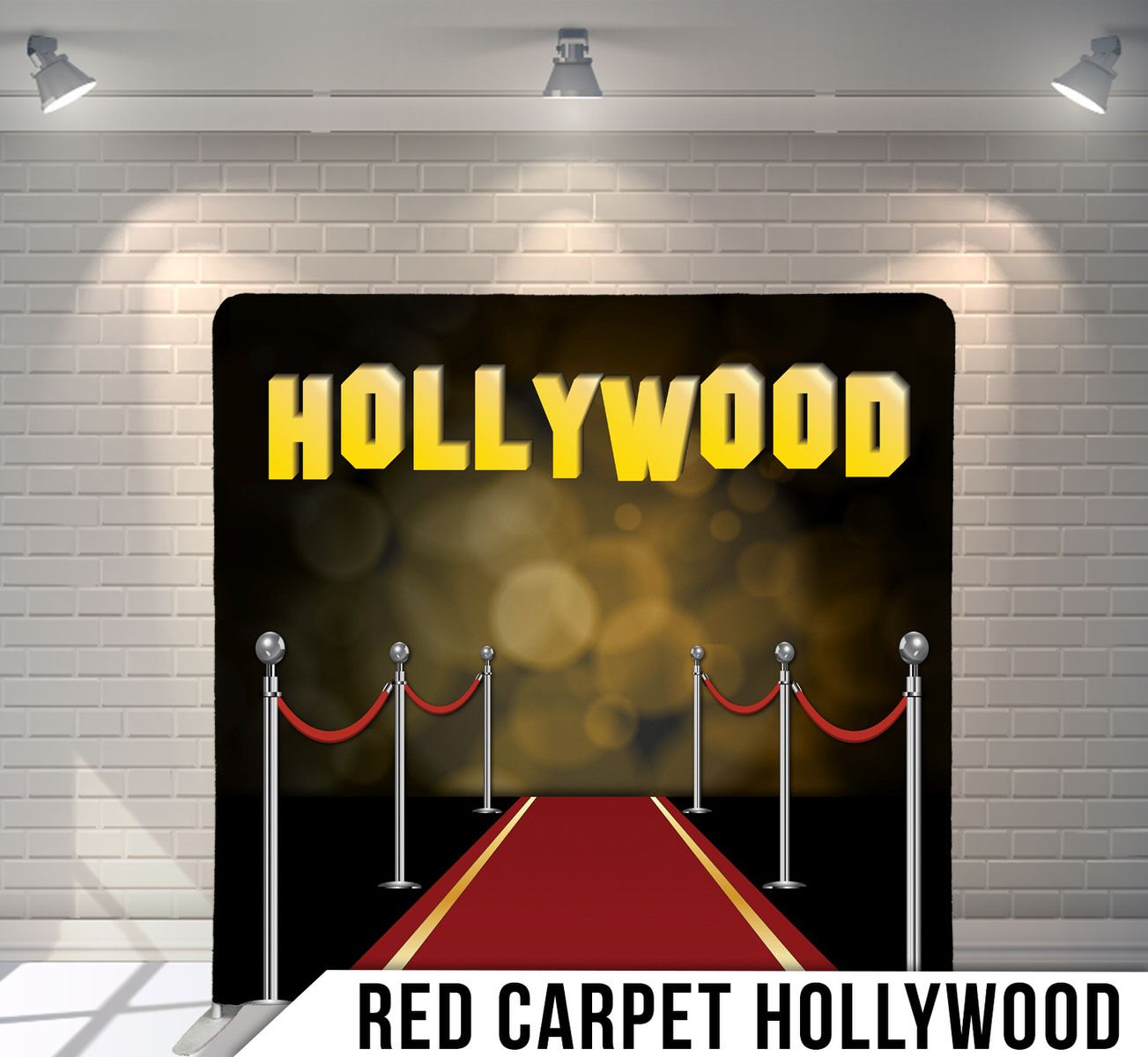 Hollywood themed backdrop with red carpet and gold illuminated sign against dark background.