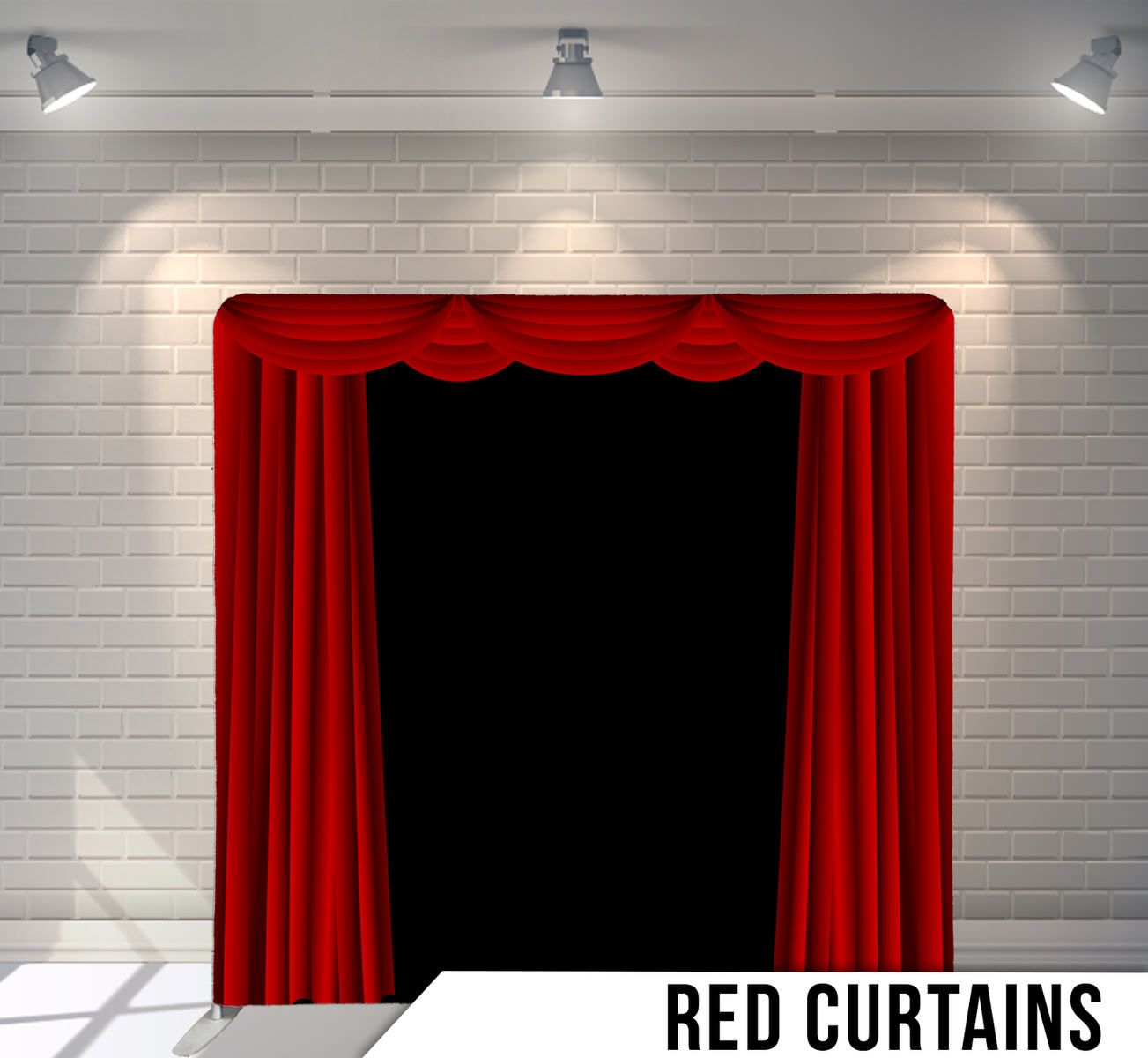 Red velvet stage curtains with pleated draping against white brick wall.