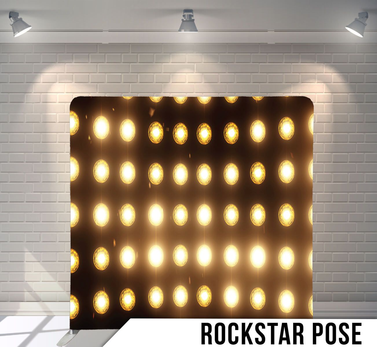 Grid of warm glowing spotlights arranged in rows on dark background for theatrical lighting.