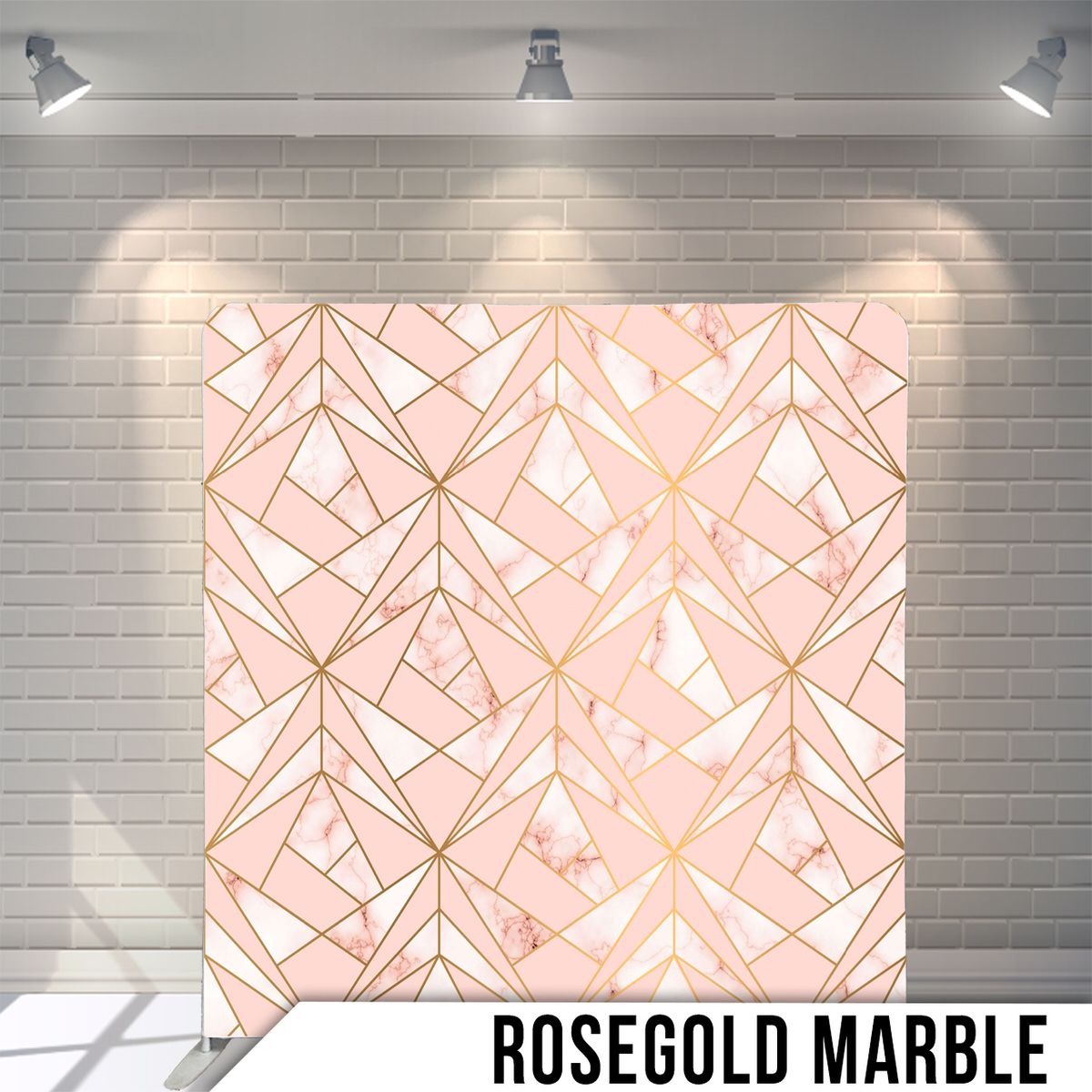 Geometric rose gold marble pattern with art deco inspired lines on pink background.