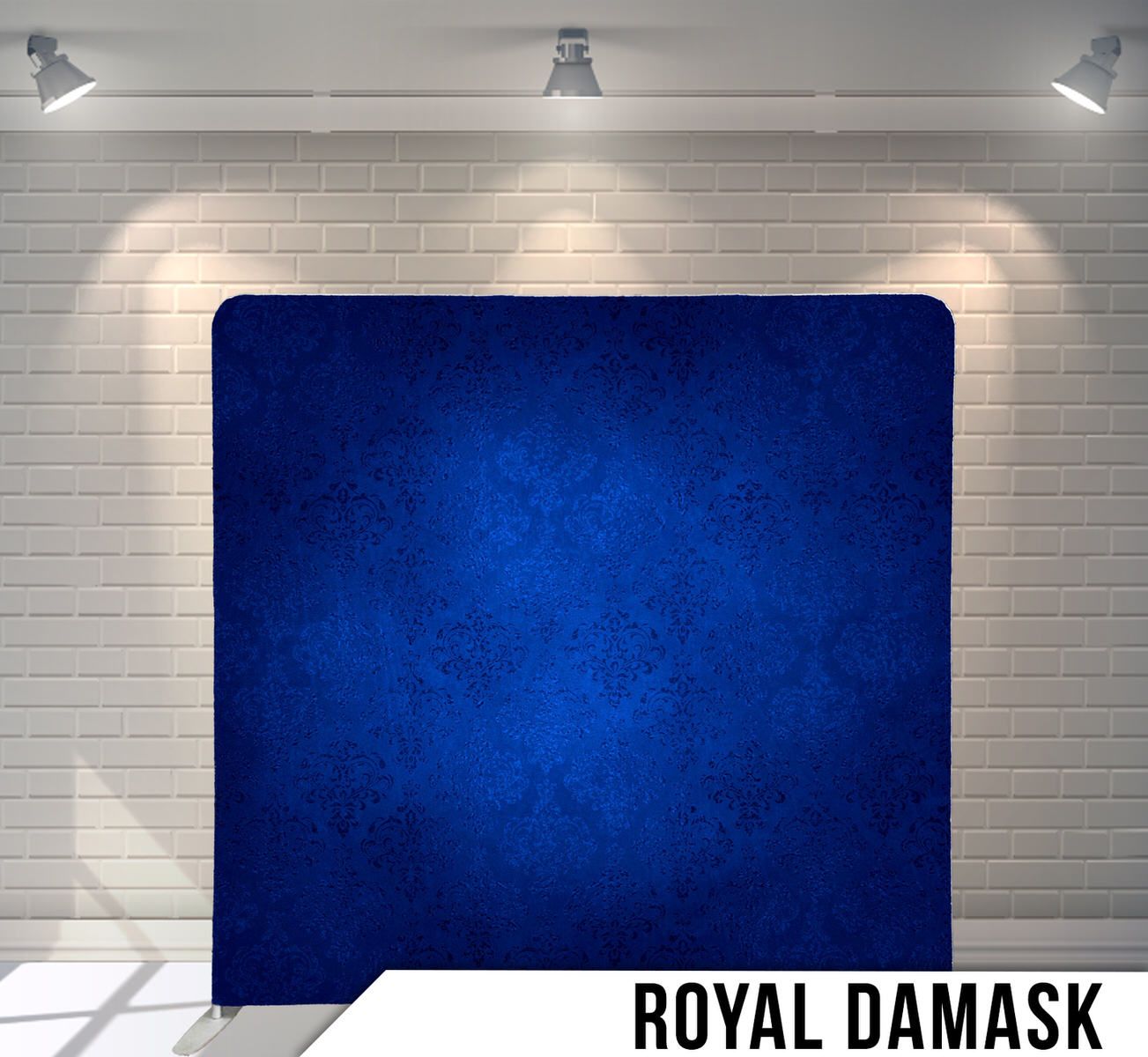 Rich royal blue damask patterned backdrop with vintage-inspired textural design.