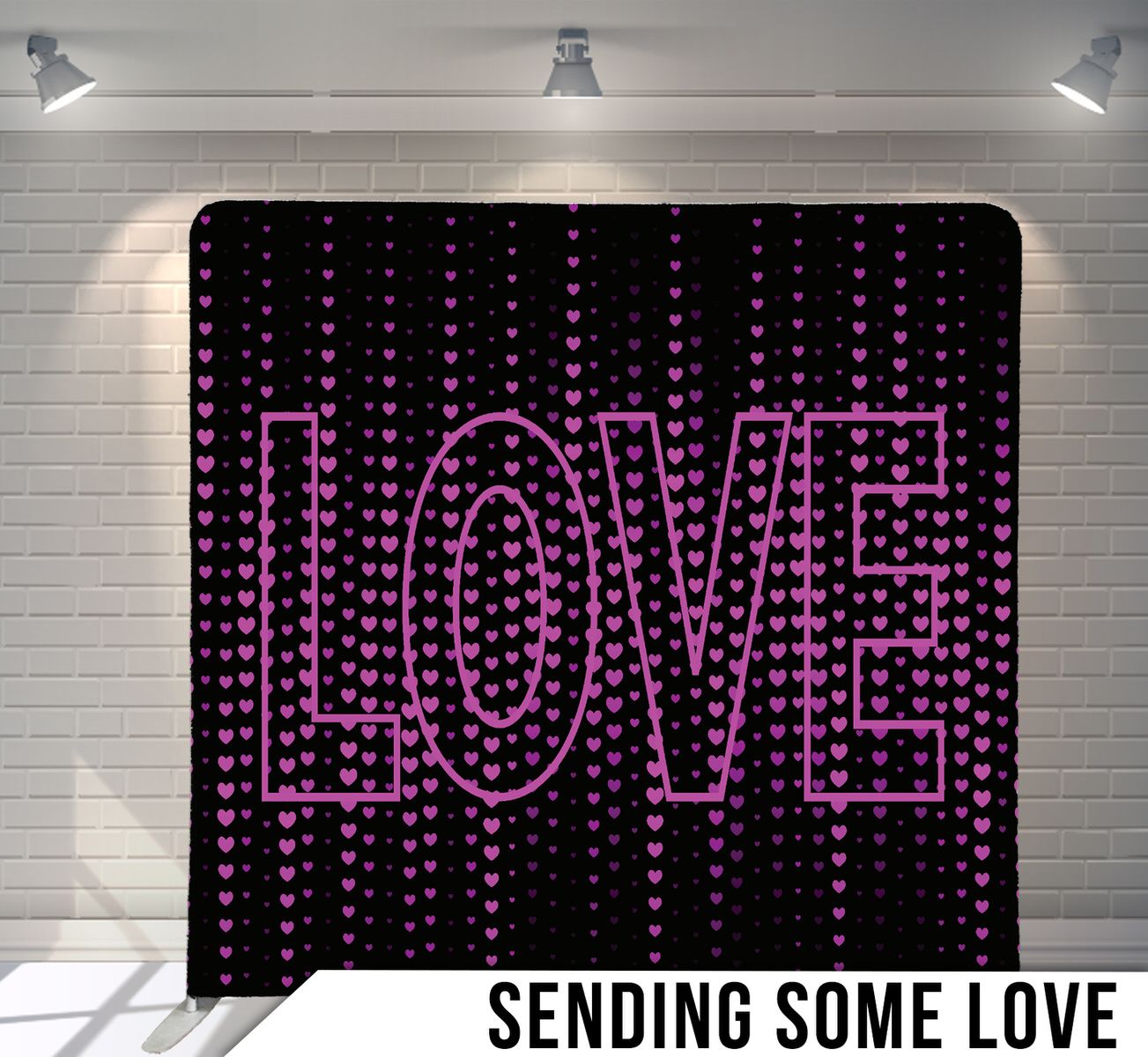 Neon pink LOVE sign with cascading heart lights on black backdrop creates romantic atmosphere.