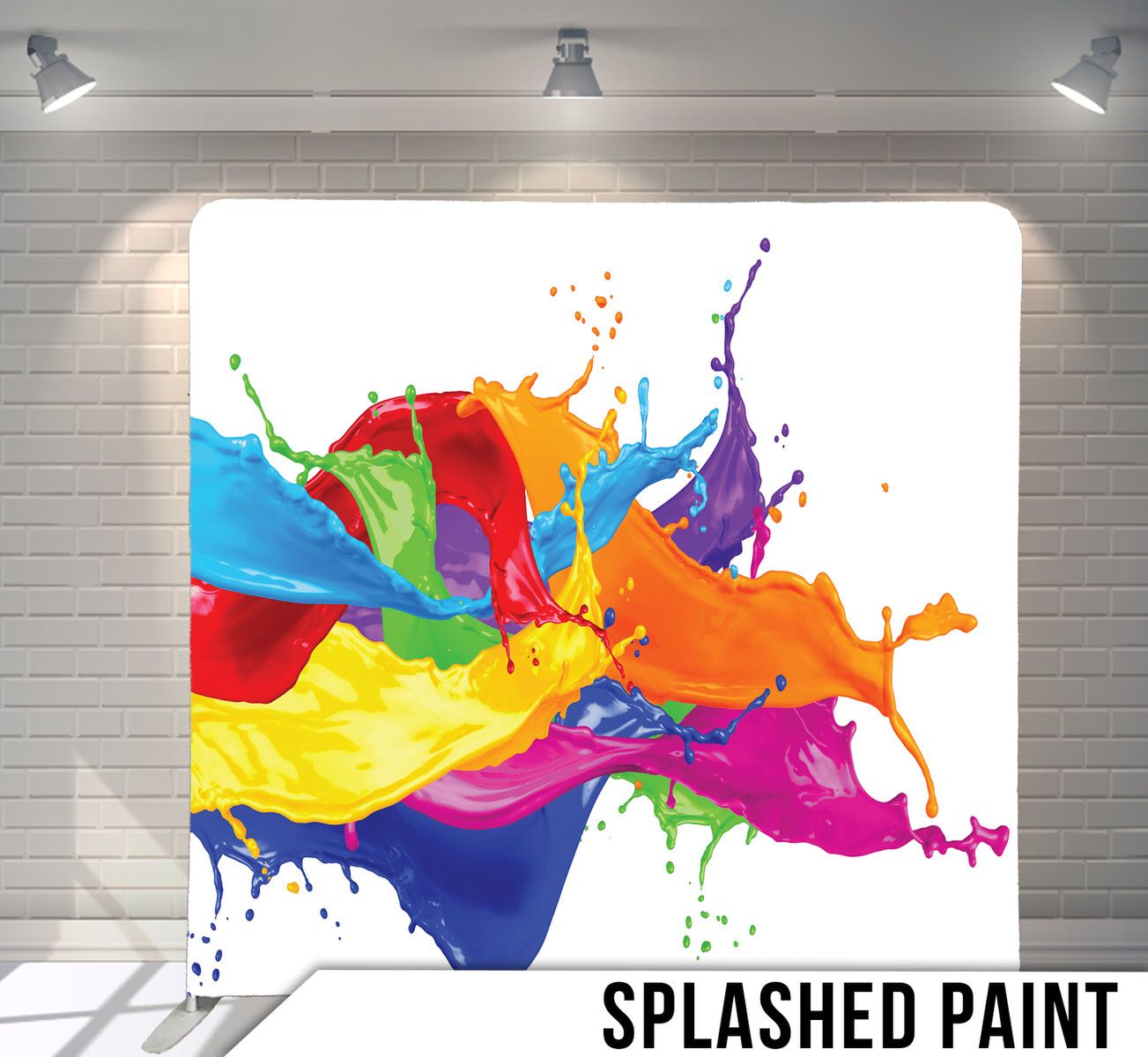 Dynamic splash of colorful paint in rainbow hues against white background.