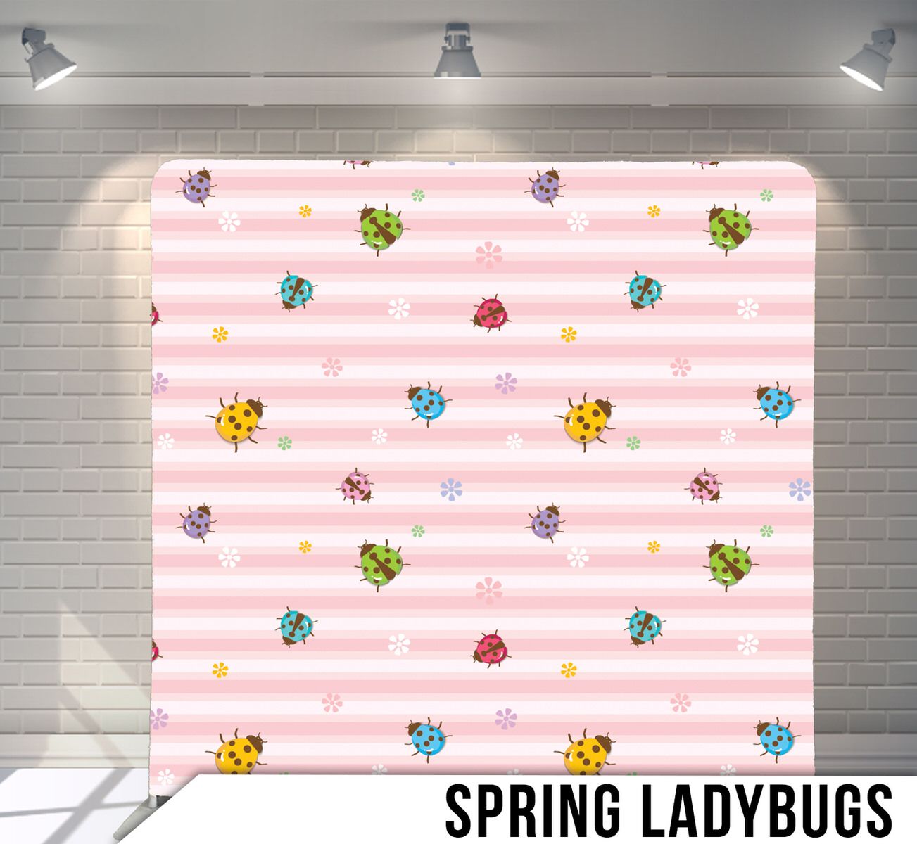 Pink and white striped background with colorful cartoon ladybugs scattered throughout.