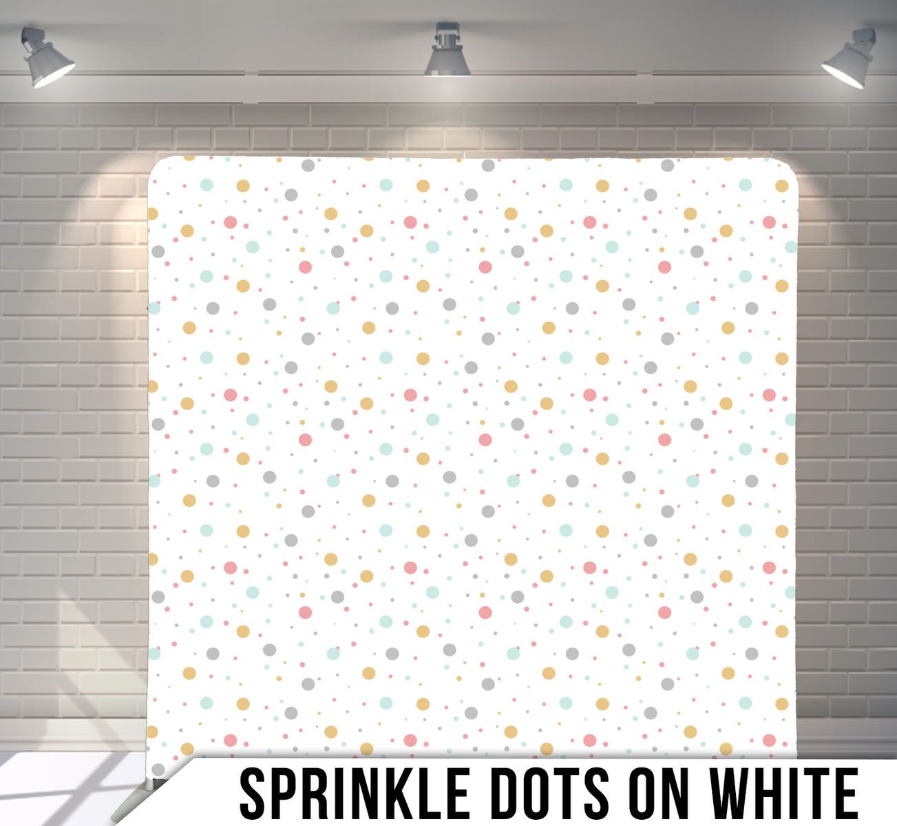 White background with scattered rainbow-colored polka dots in a repeating pattern.