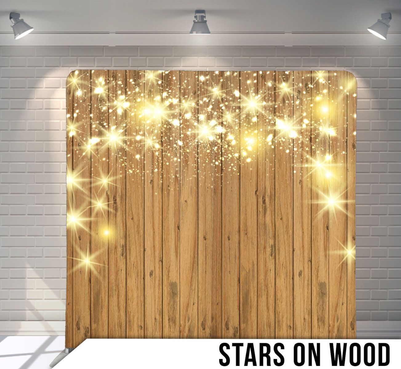 Glowing golden star lights and sparkles cascading down on rustic wooden planks background.