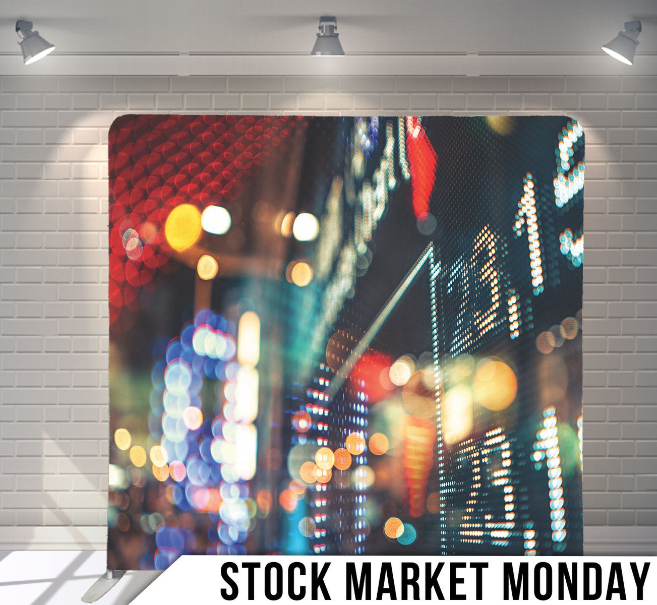 Blurred city lights and stock market display numbers in blue and red tones.