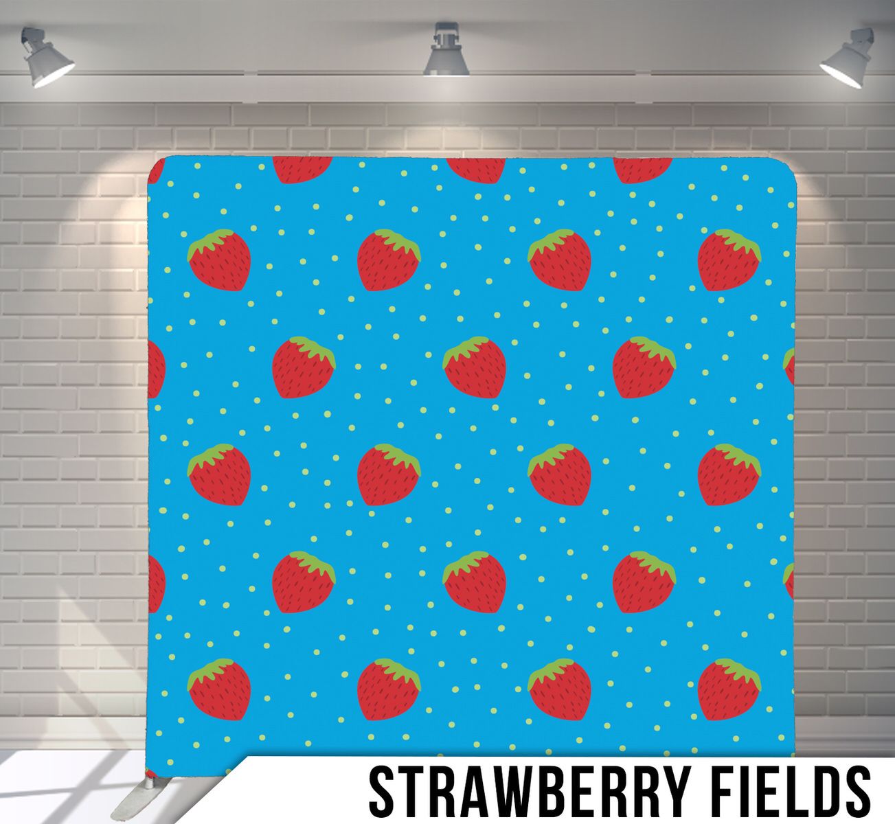 Blue background pattern with red strawberries and small white dots scattered throughout.