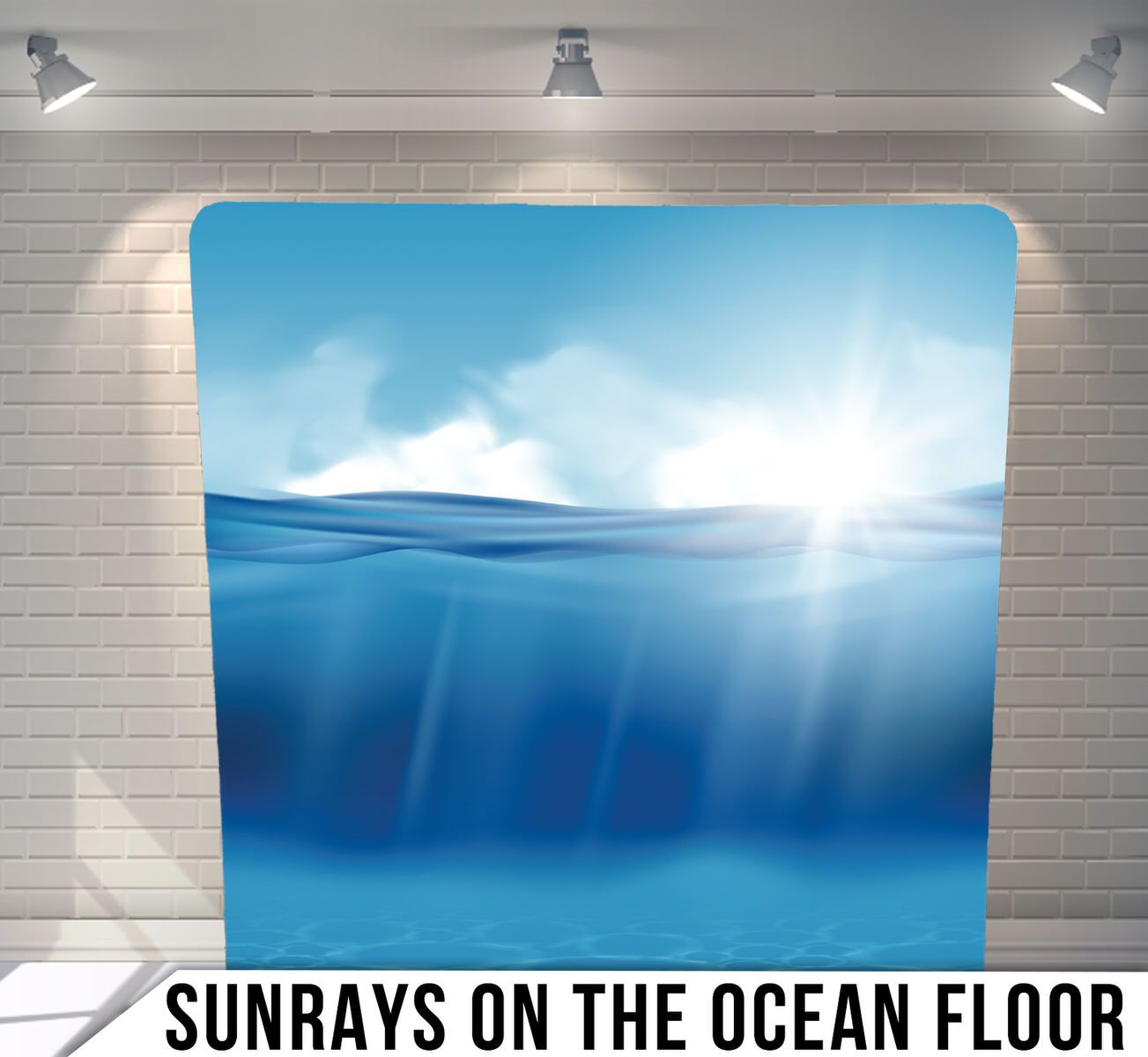 Underwater scene showing sunlight beams penetrating deep blue ocean waters with rays illuminating the seafloor.