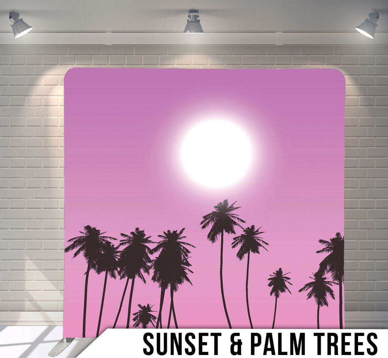 Silhouettes of palm trees against vibrant pink sky with bright sun.