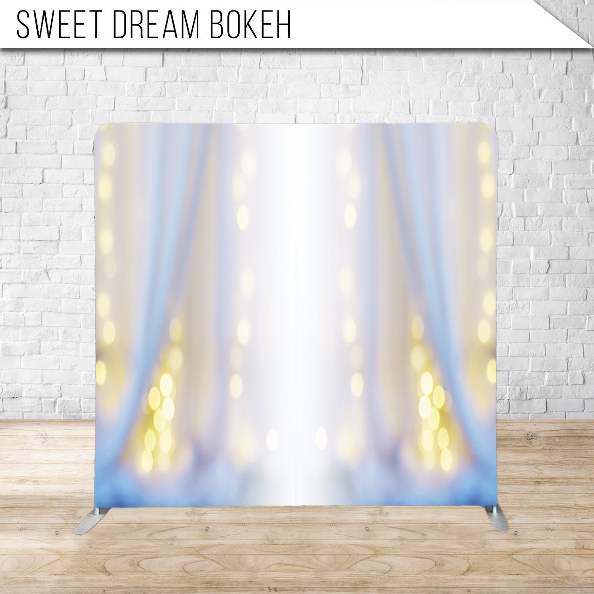 Ethereal bokeh backdrop with gentle blue and golden light particles.
