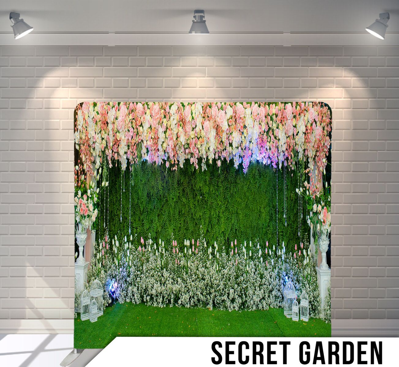 Enchanting floral backdrop with hanging wisteria flowers, white blossoms and green grass for garden-themed photography.