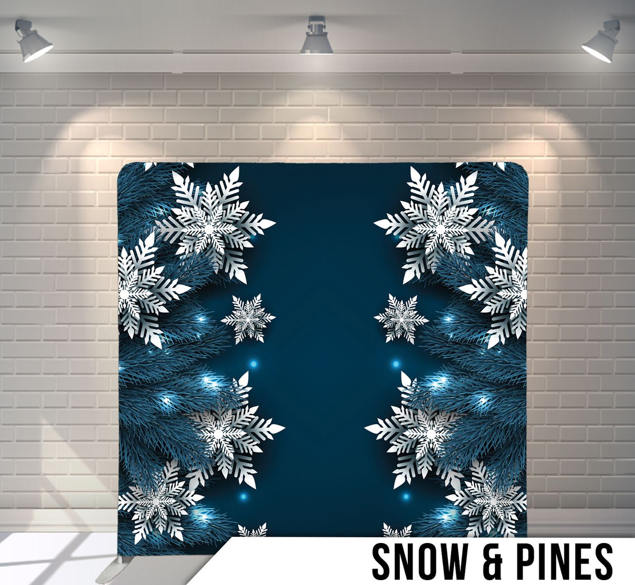 Decorative snowflake design on dark blue background with winter pine elements.