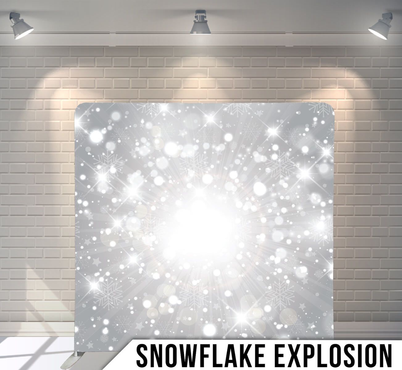 Bright white snowflake explosion effect radiating from center on grey background.