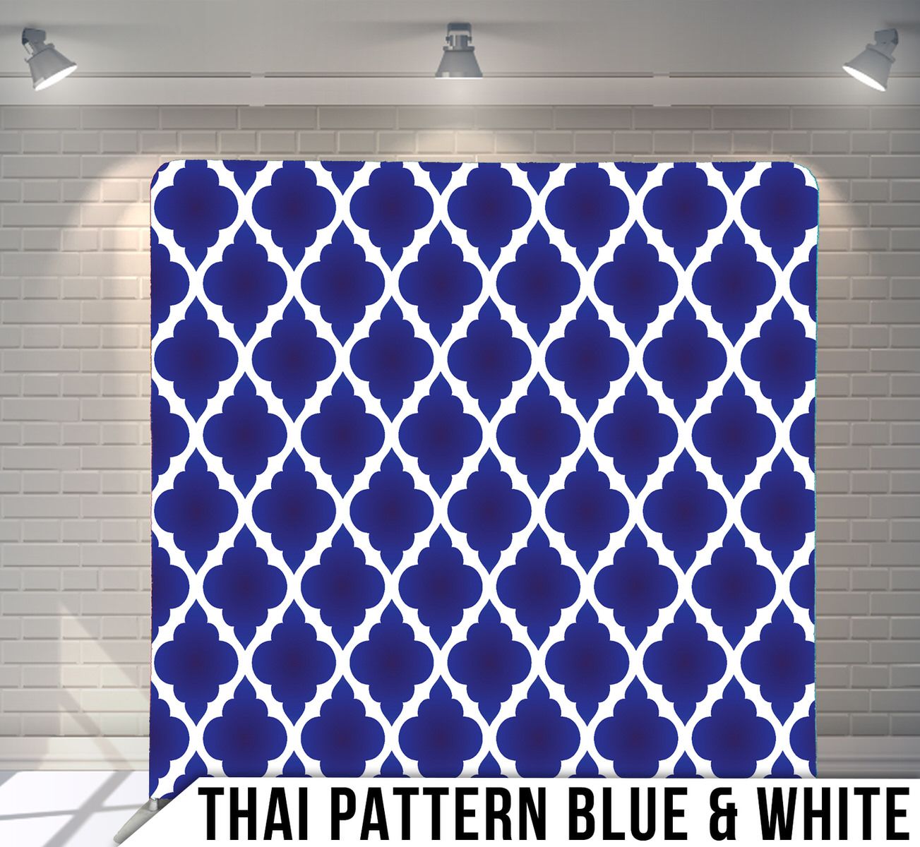 Navy blue and white Moroccan quatrefoil pattern backdrop with geometric lattice design.