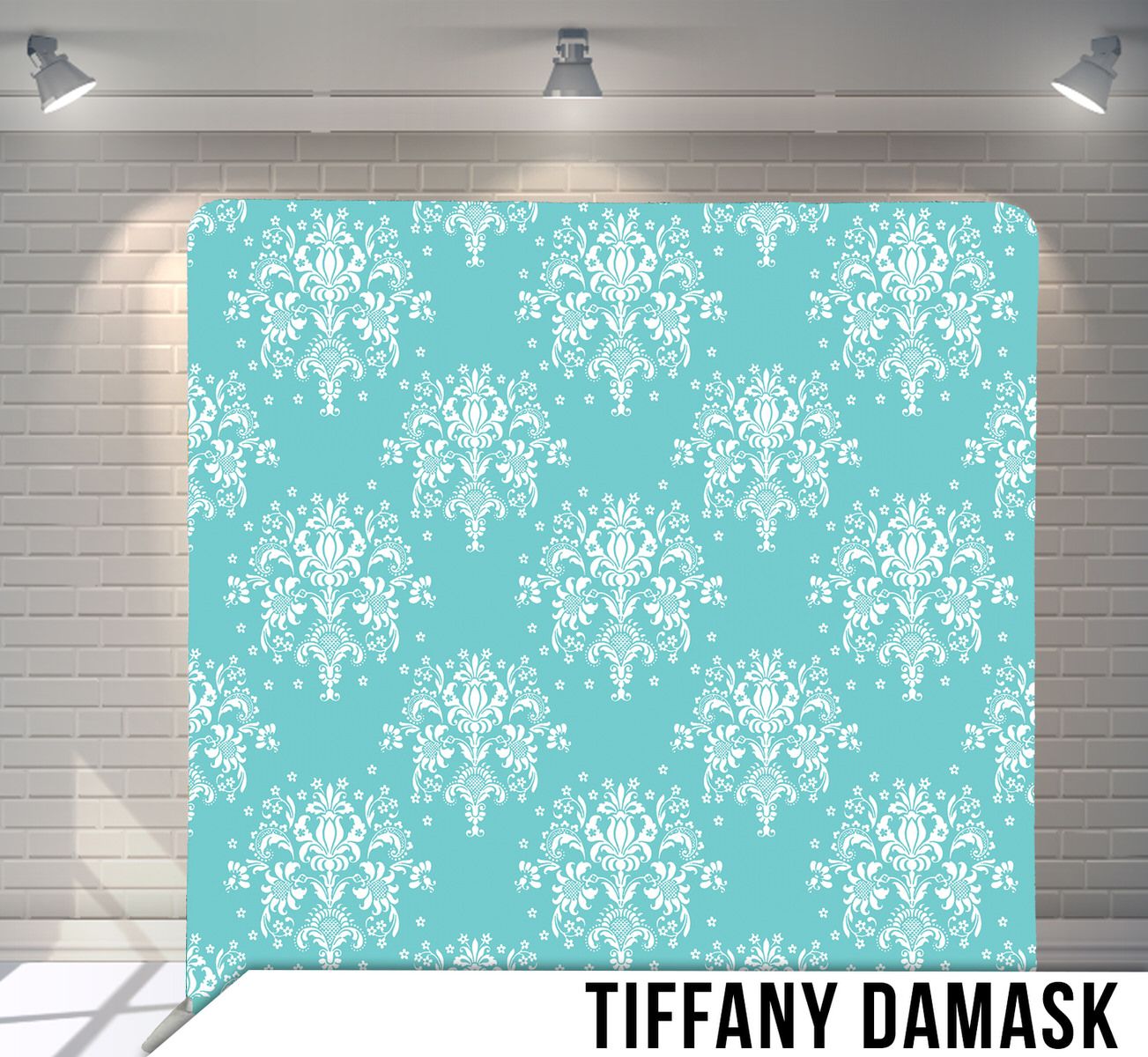 Tiffany blue damask pattern backdrop with elegant white ornate floral designs.