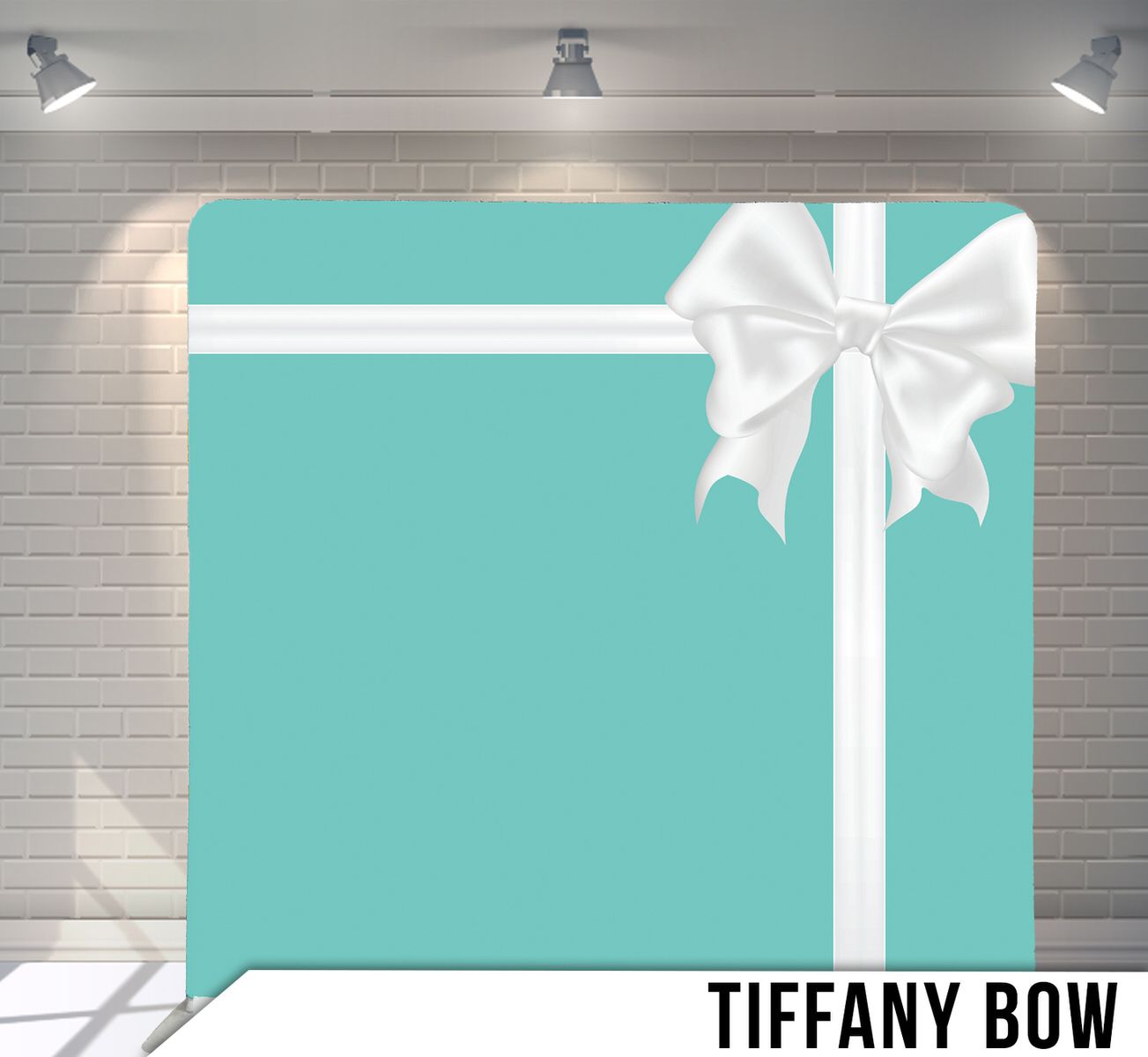 Elegant Tiffany blue backdrop with large white decorative bow ribbon design.