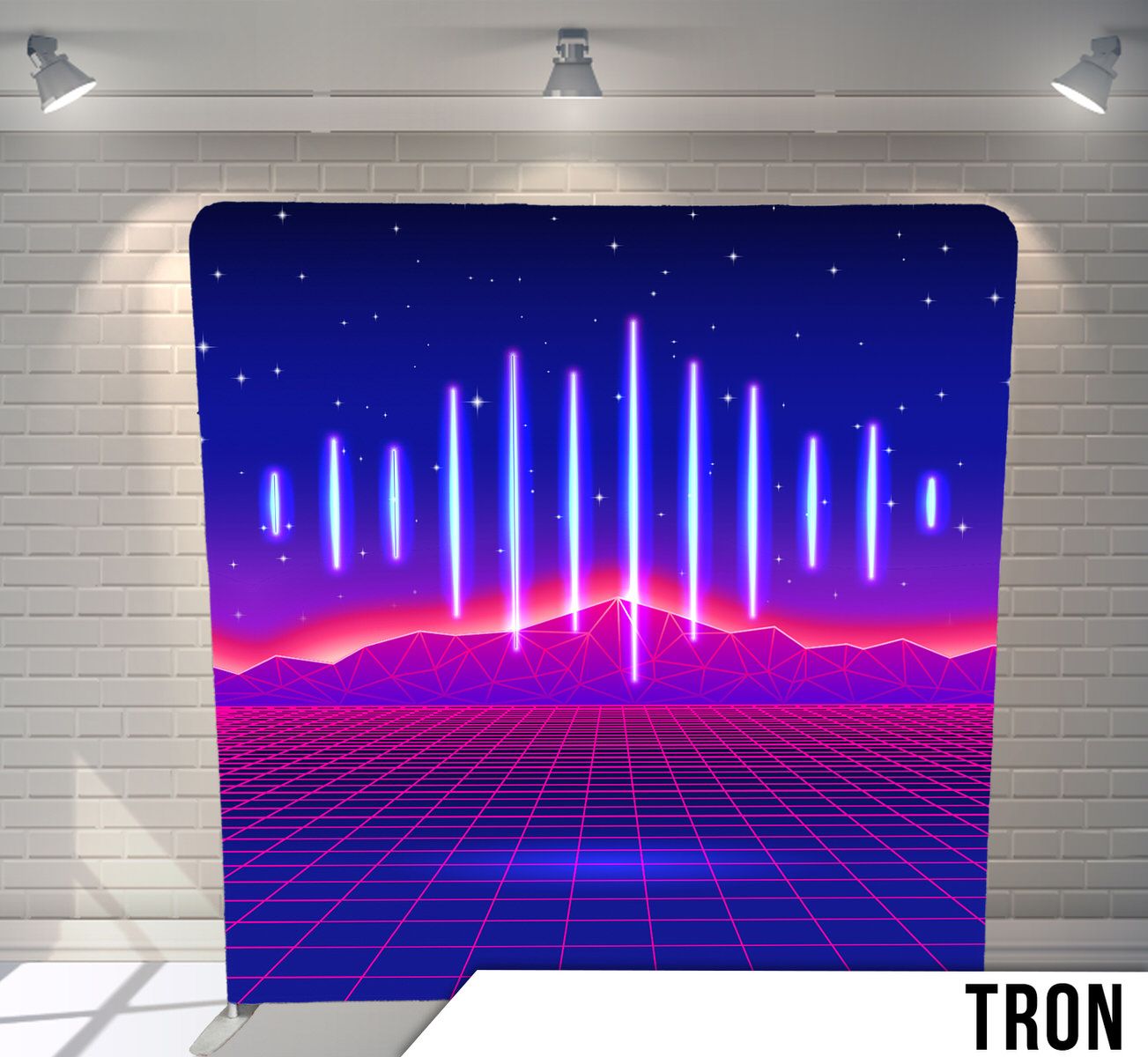 Retro synthwave landscape with neon lights, grid floor and purple mountains against starry sky.