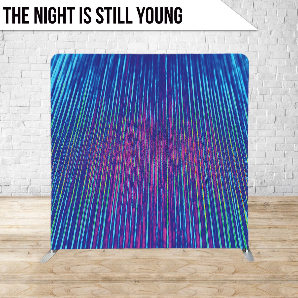 Abstract backdrop with vertical blue and pink light streaks creating a rain-like effect.