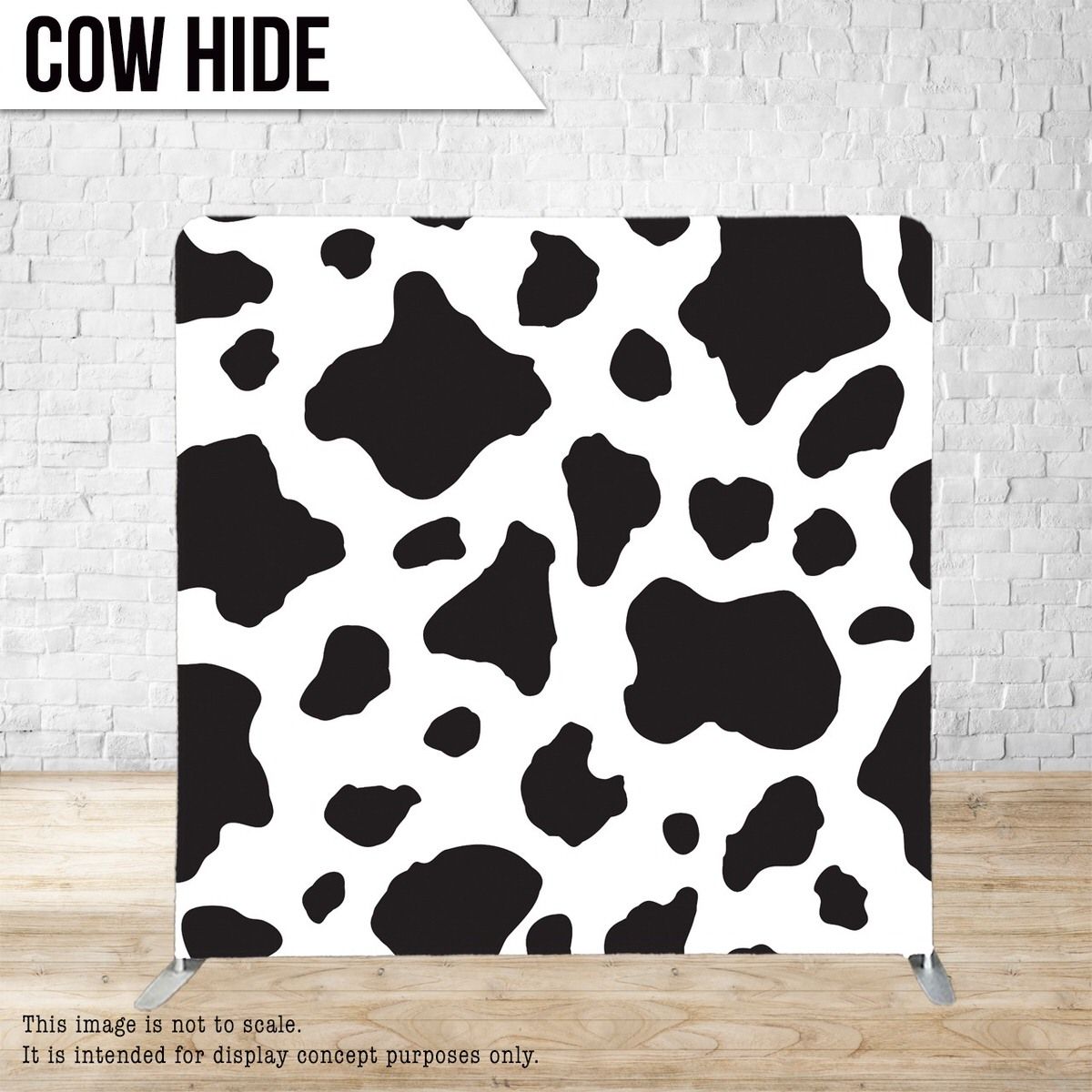 Black and white cow print pattern on a seamless white background.