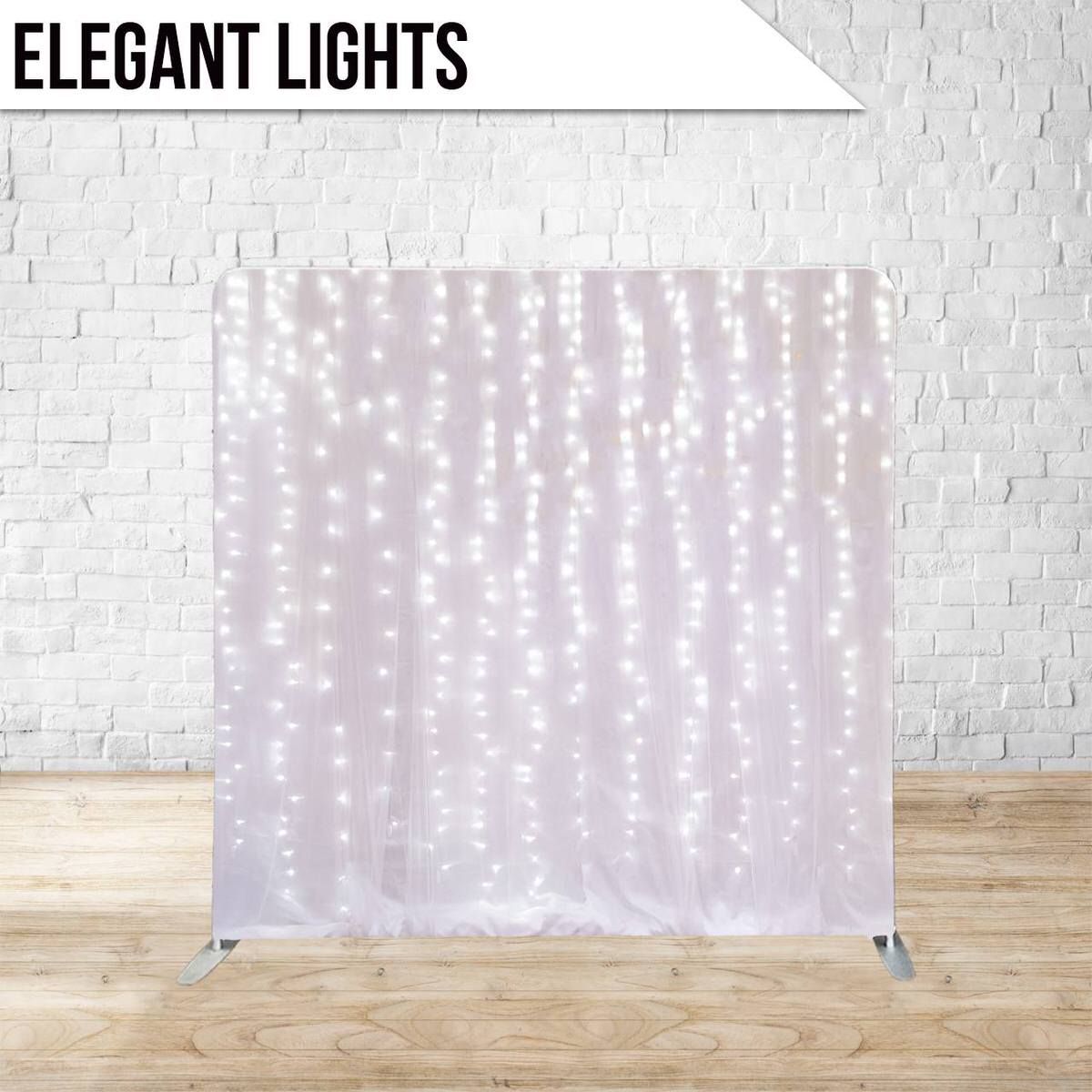 Twinkling string lights create vertical lines of illumination against a soft white backdrop.