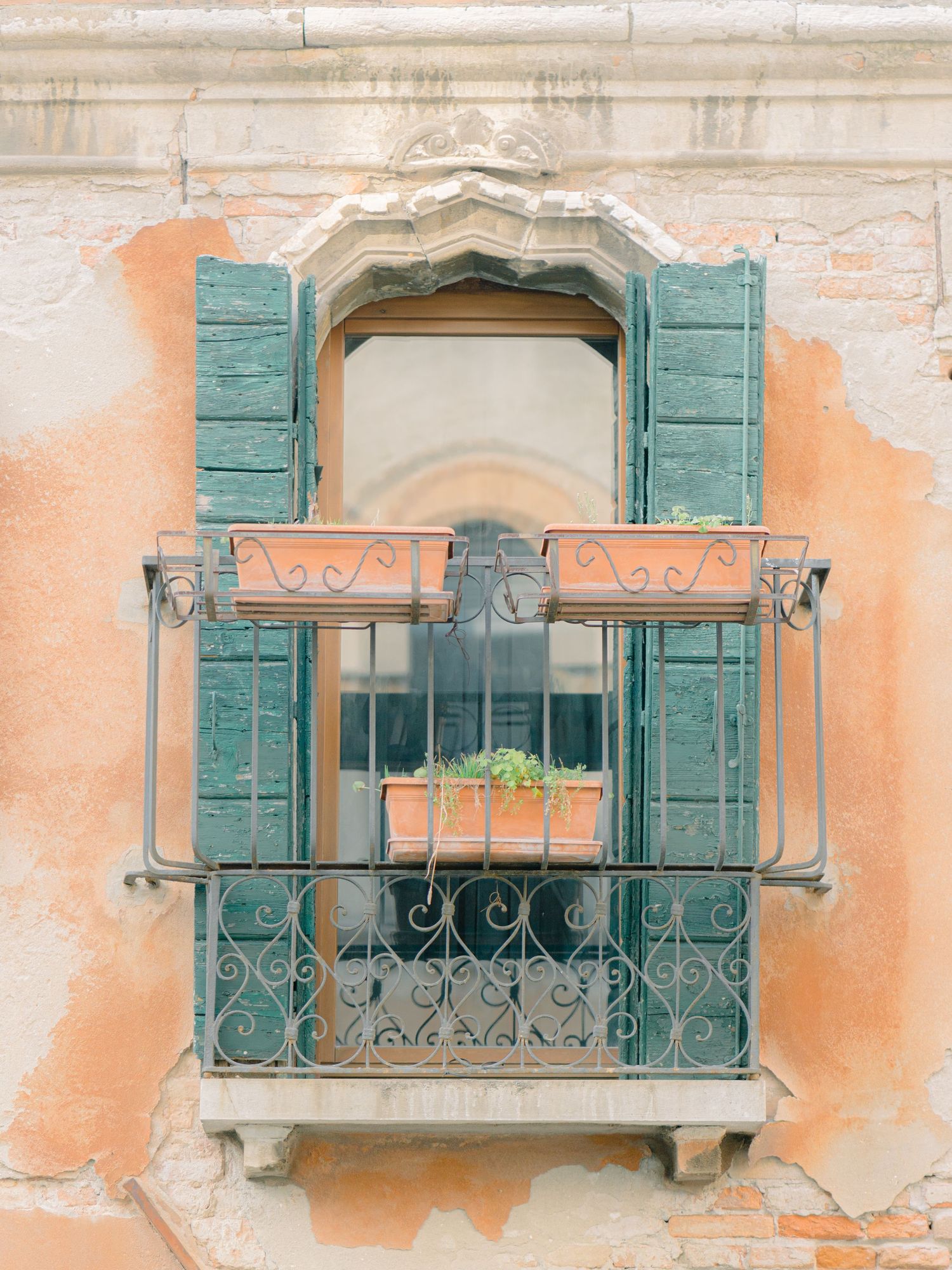 A balcony with beautiful pots in Venice Italy